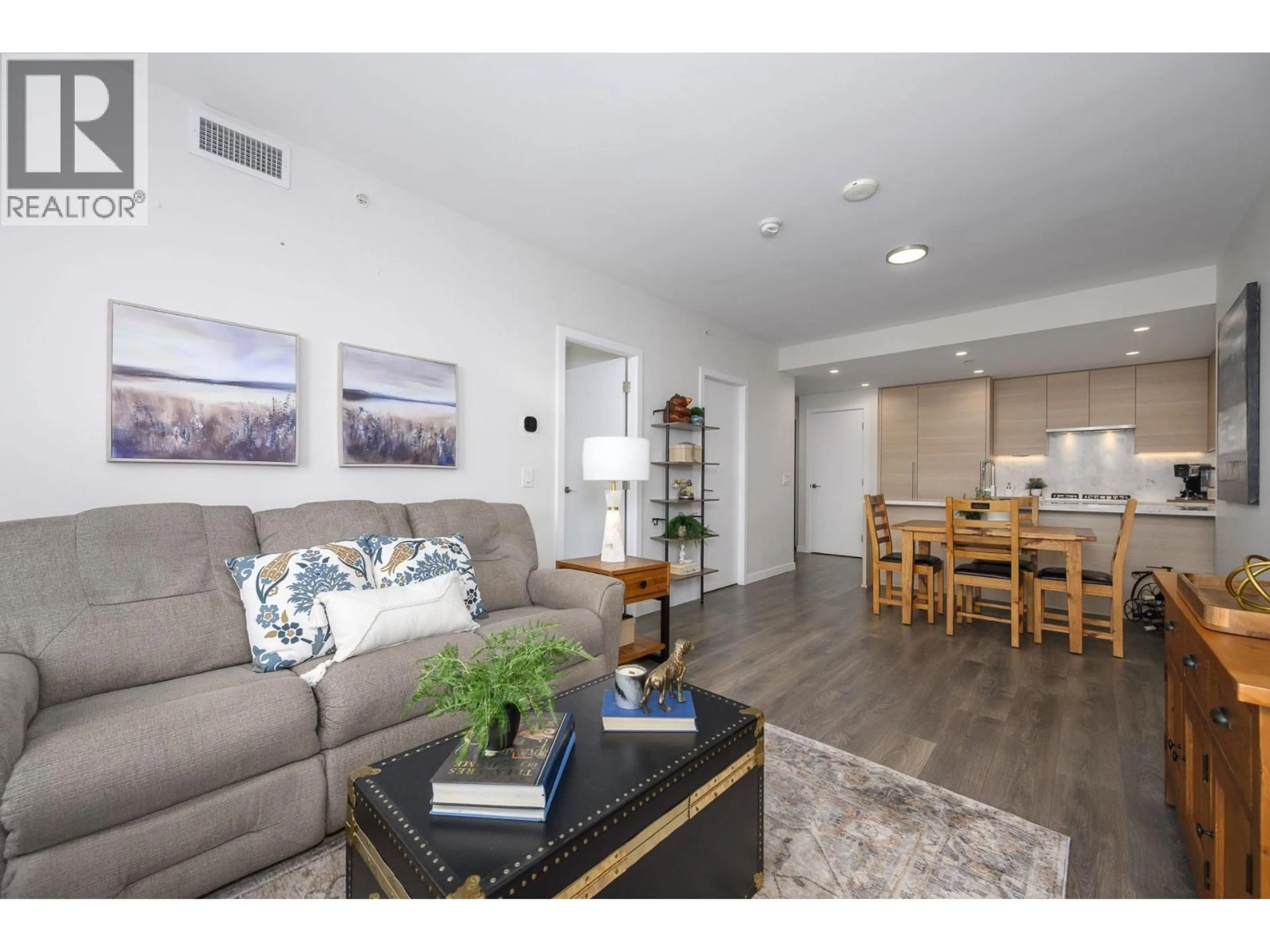 Living room with furniture, wood/laminate floor for 1801 - 305 MORRISSEY ROAD, Port Moody British Columbia V3H0M3