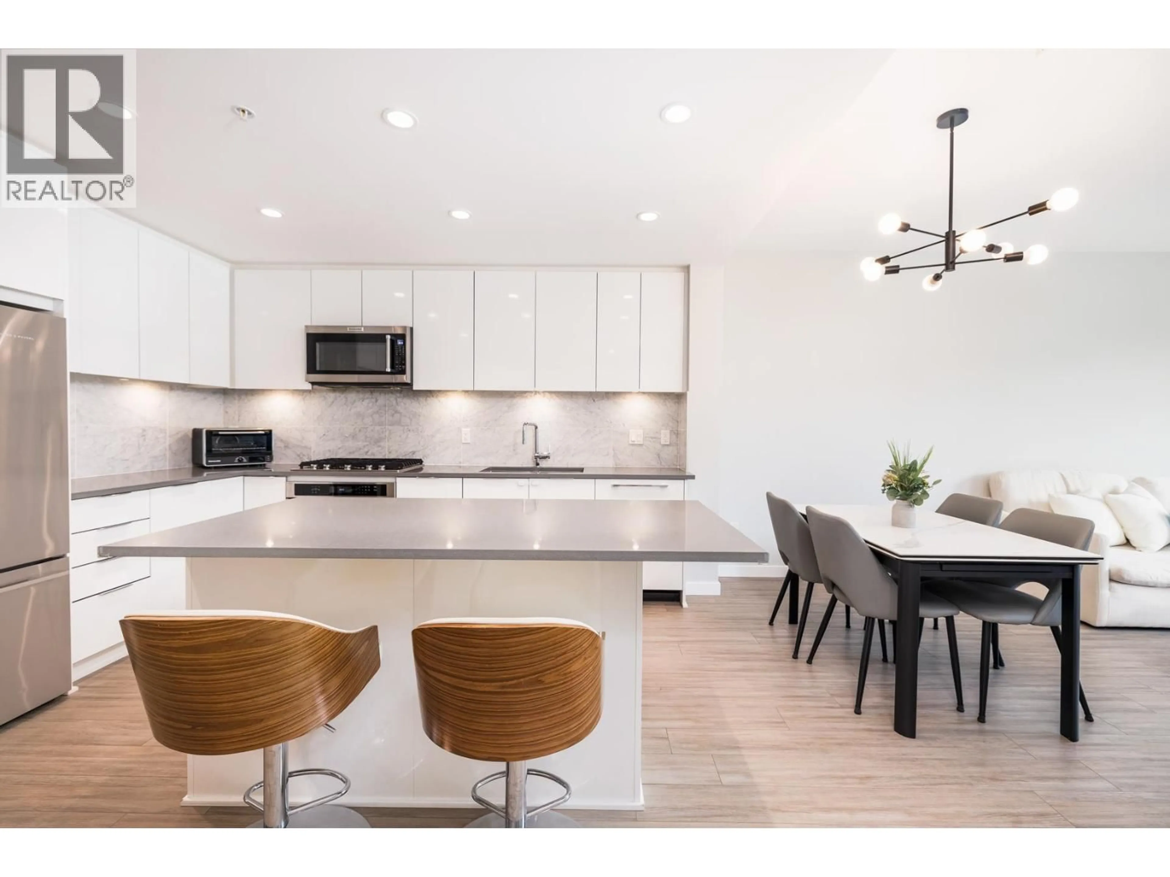 Open concept kitchen, ceramic/tile floor for 302 - 2651 LIBRARY LANE, North Vancouver British Columbia V7J0C1