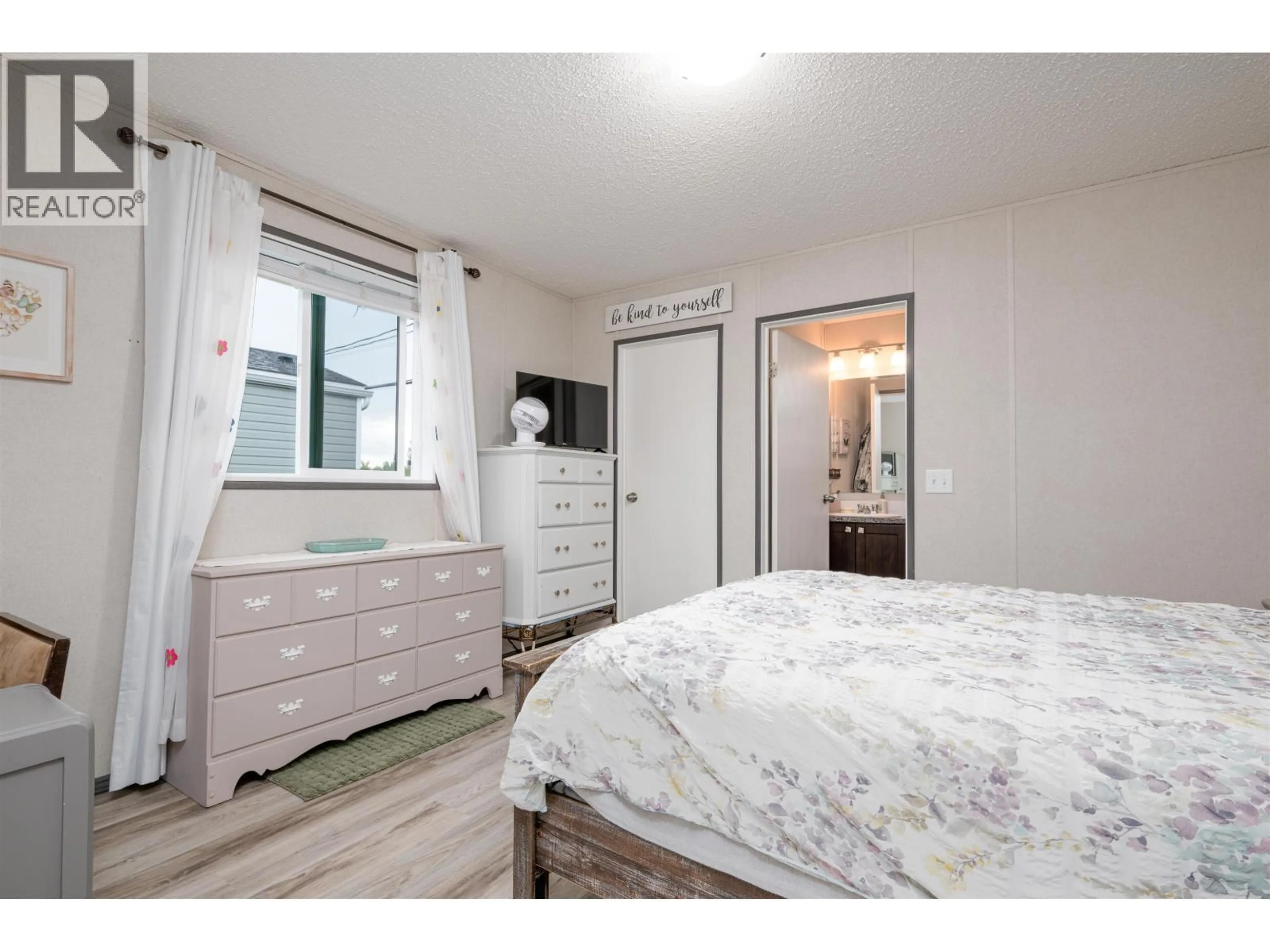 Bedroom with bed, wood/laminate floor for 13 - 8474 BUNCE ROAD, Prince George British Columbia V2N6P1