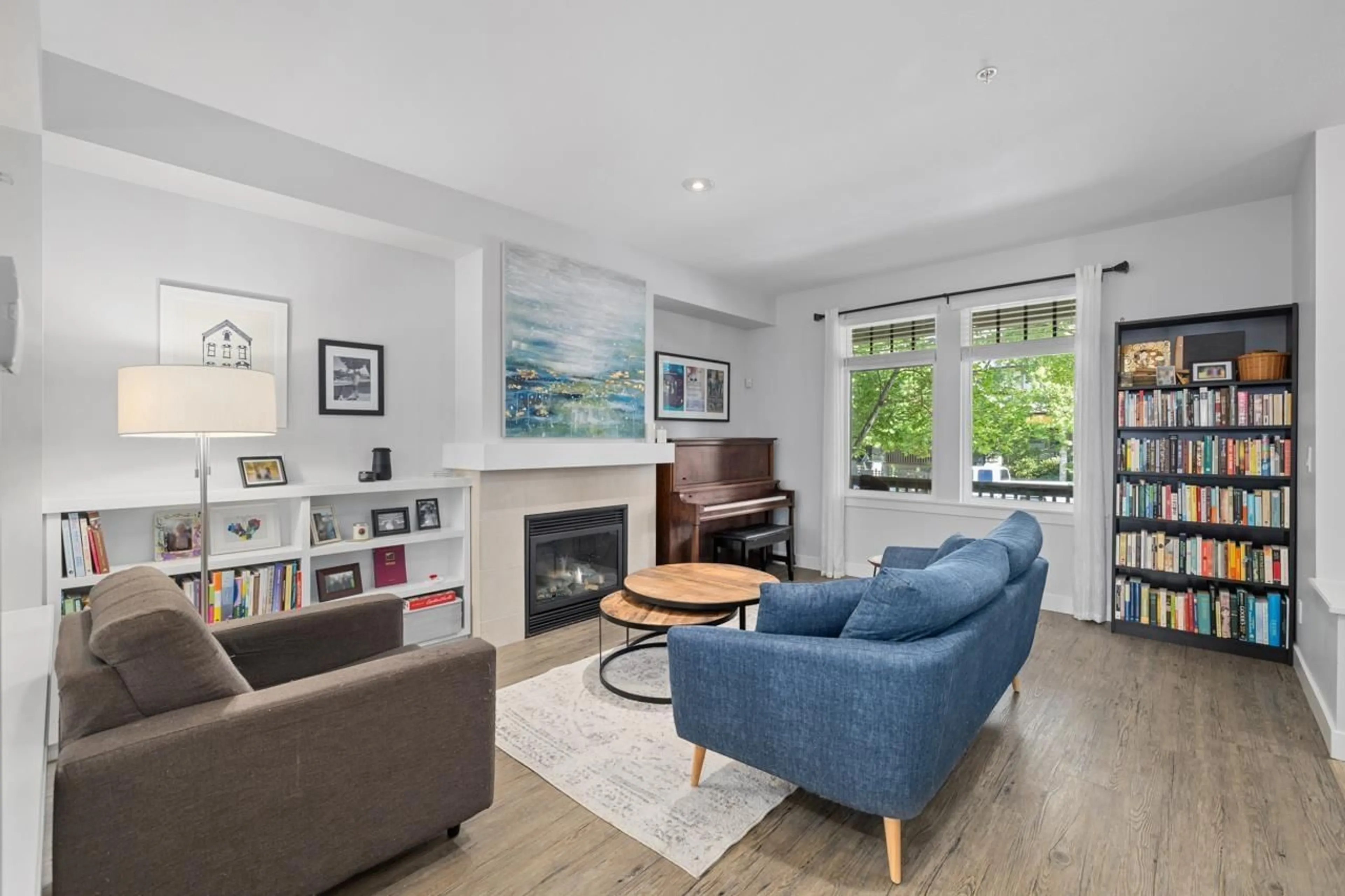 Living room with furniture, wood/laminate floor for 22994 BILLY BROWN ROAD, Langley British Columbia V1M4G2