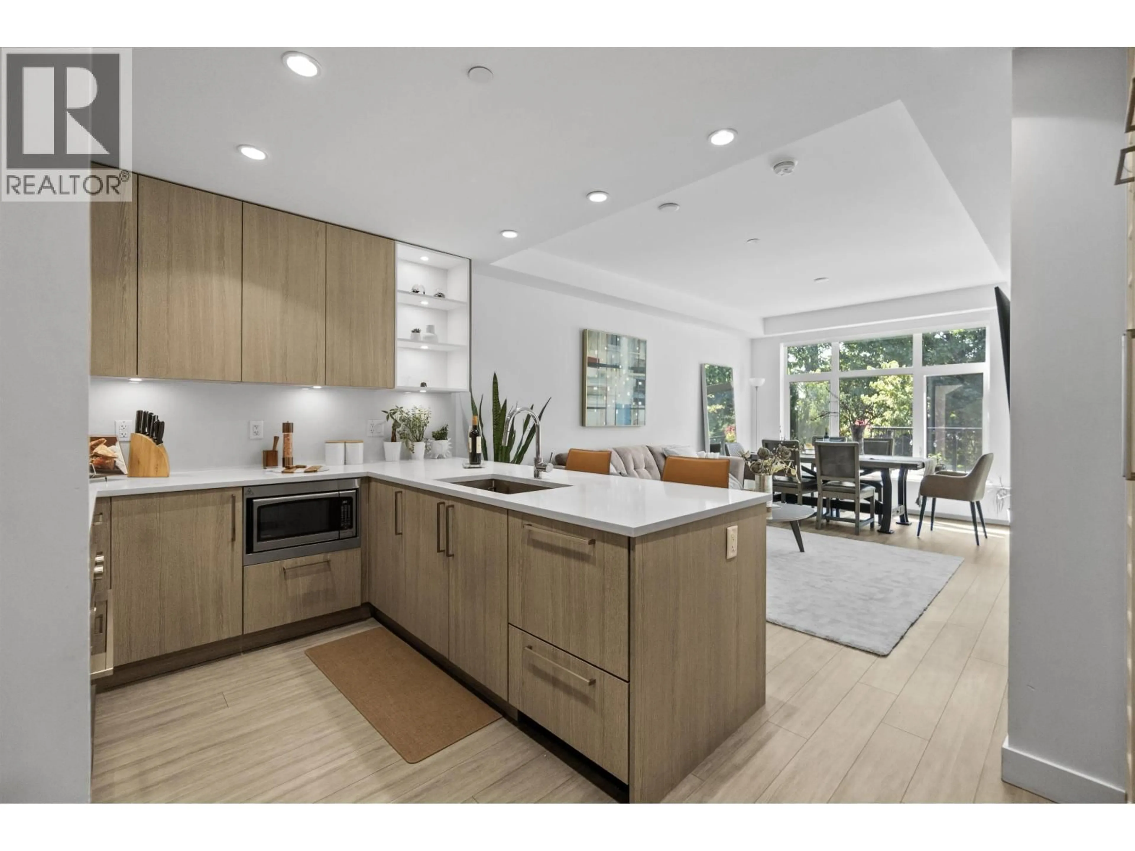 Open concept kitchen, unknown for 113 - 747 3RD STREET, North Vancouver British Columbia V7L1G8