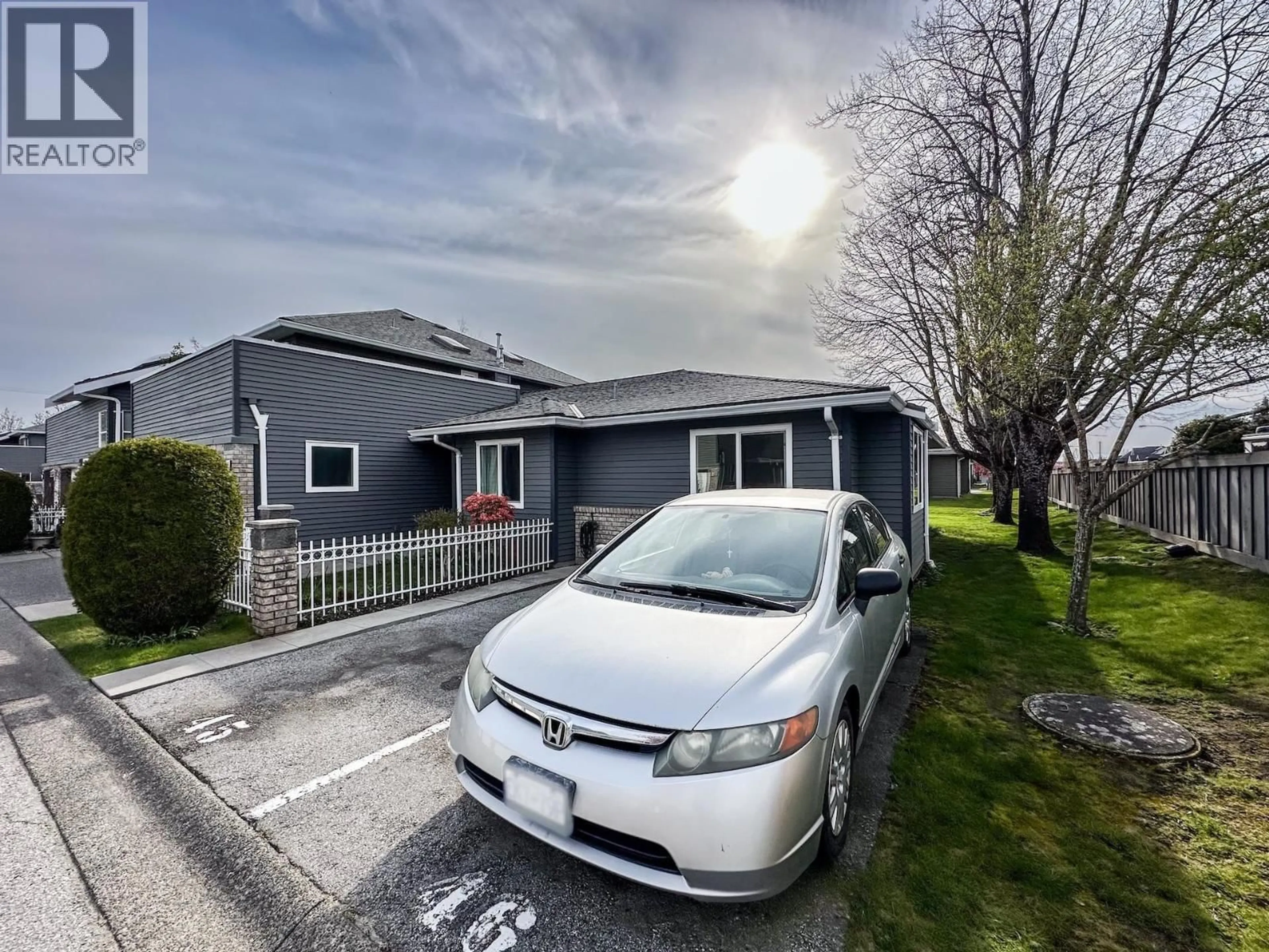 A pic from outside/outdoor area/front of a property/back of a property/a pic from drone, street for 16 - 6320 48A AVENUE, Delta British Columbia V4K4W3