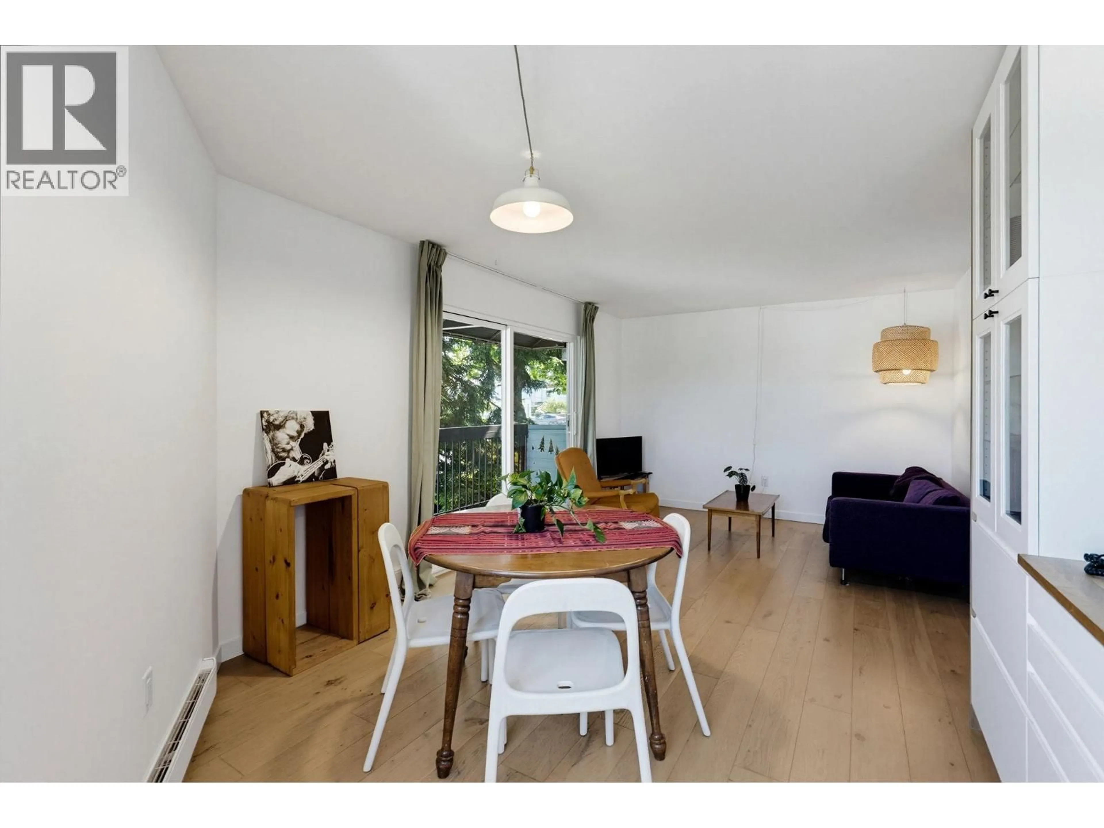 Dining room, wood/laminate floor for 219 - 2910 PENDER STREET, Vancouver British Columbia V5K2C3