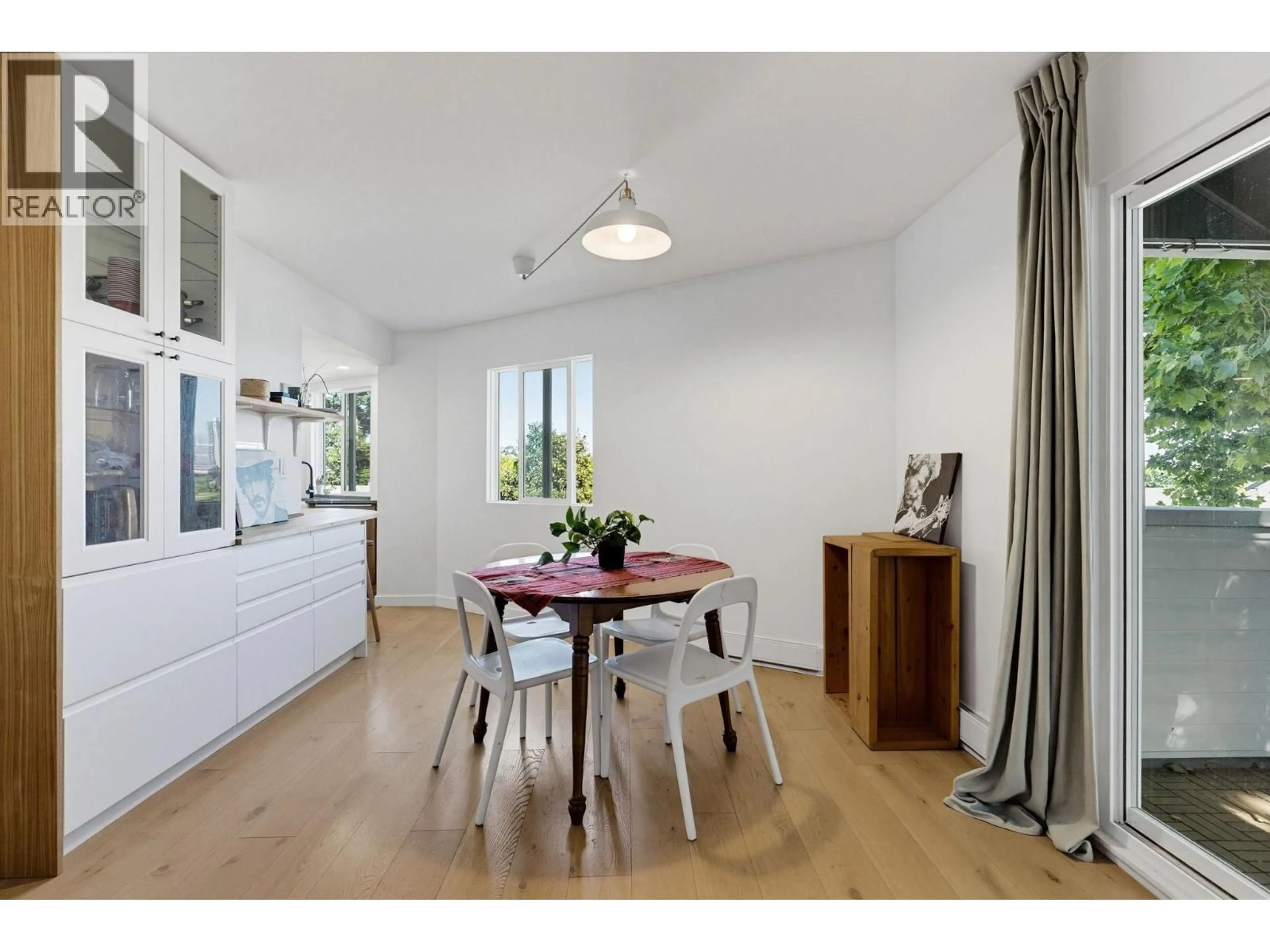 Dining room, wood/laminate floor for 219 - 2910 PENDER STREET, Vancouver British Columbia V5K2C3