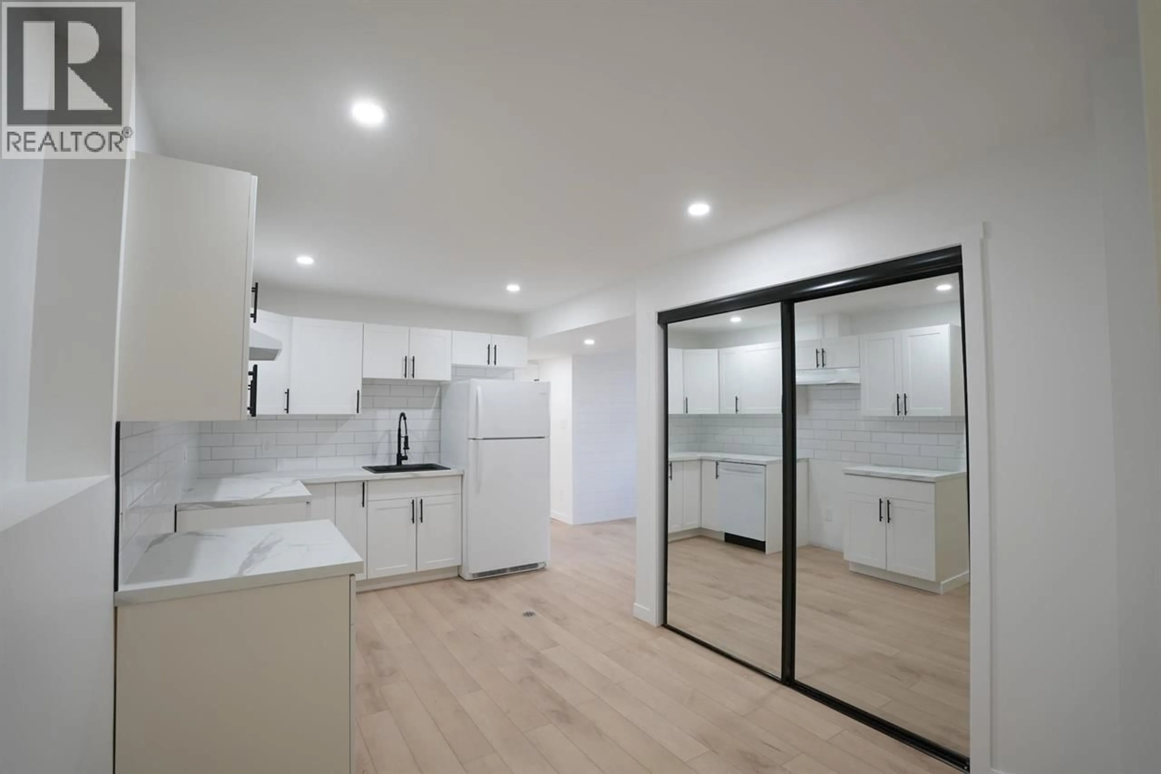 Open concept kitchen, unknown for 1497 MCCULLAGH AVENUE, Prince George British Columbia V2L5A3