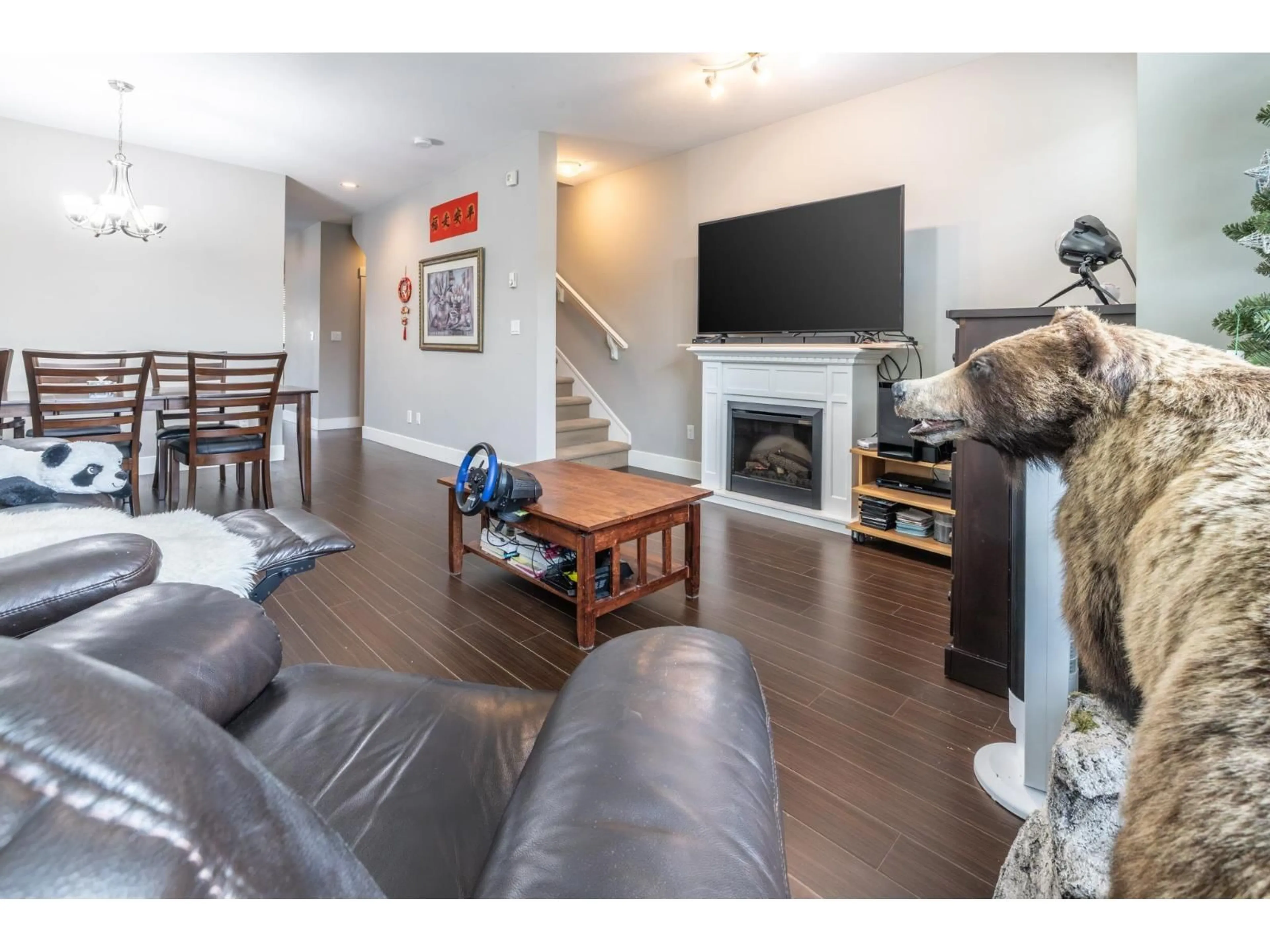 Living room with furniture, wood/laminate floor for 49 - 8418 163 STREET, Surrey British Columbia V4N6K8