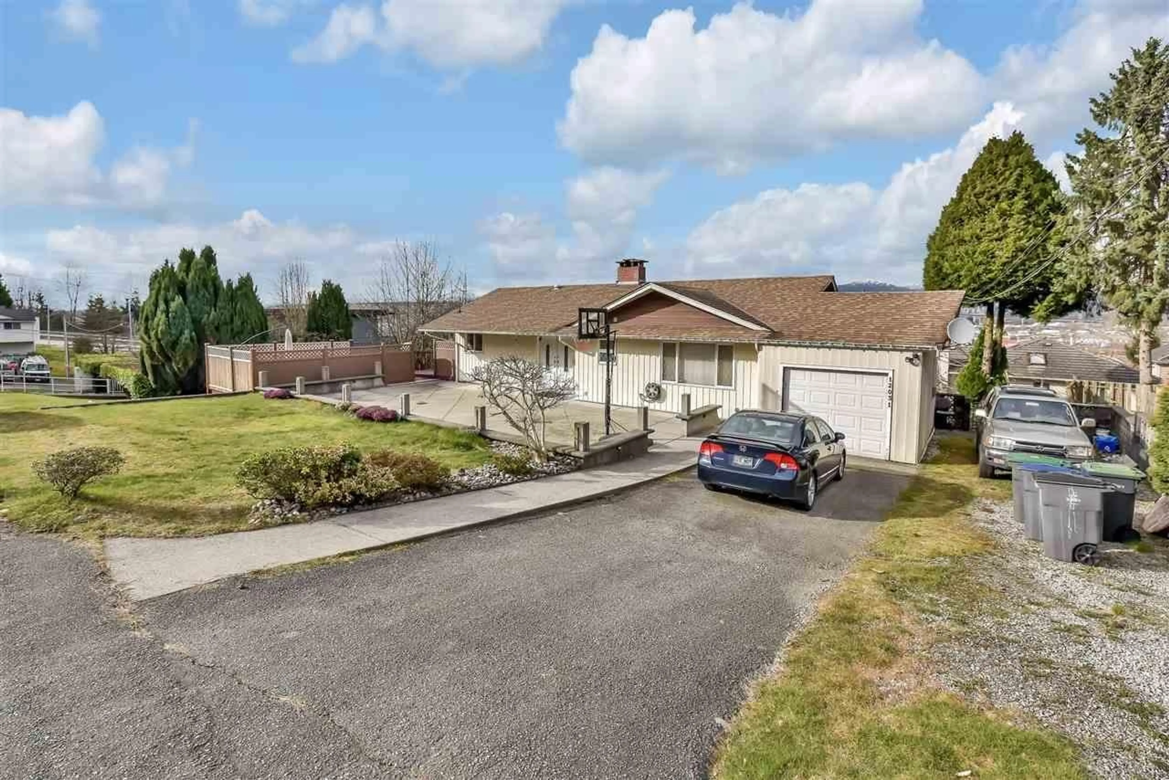 A pic from outside/outdoor area/front of a property/back of a property/a pic from drone, street for 12031 101 AVENUE, Surrey British Columbia V3V2Z2