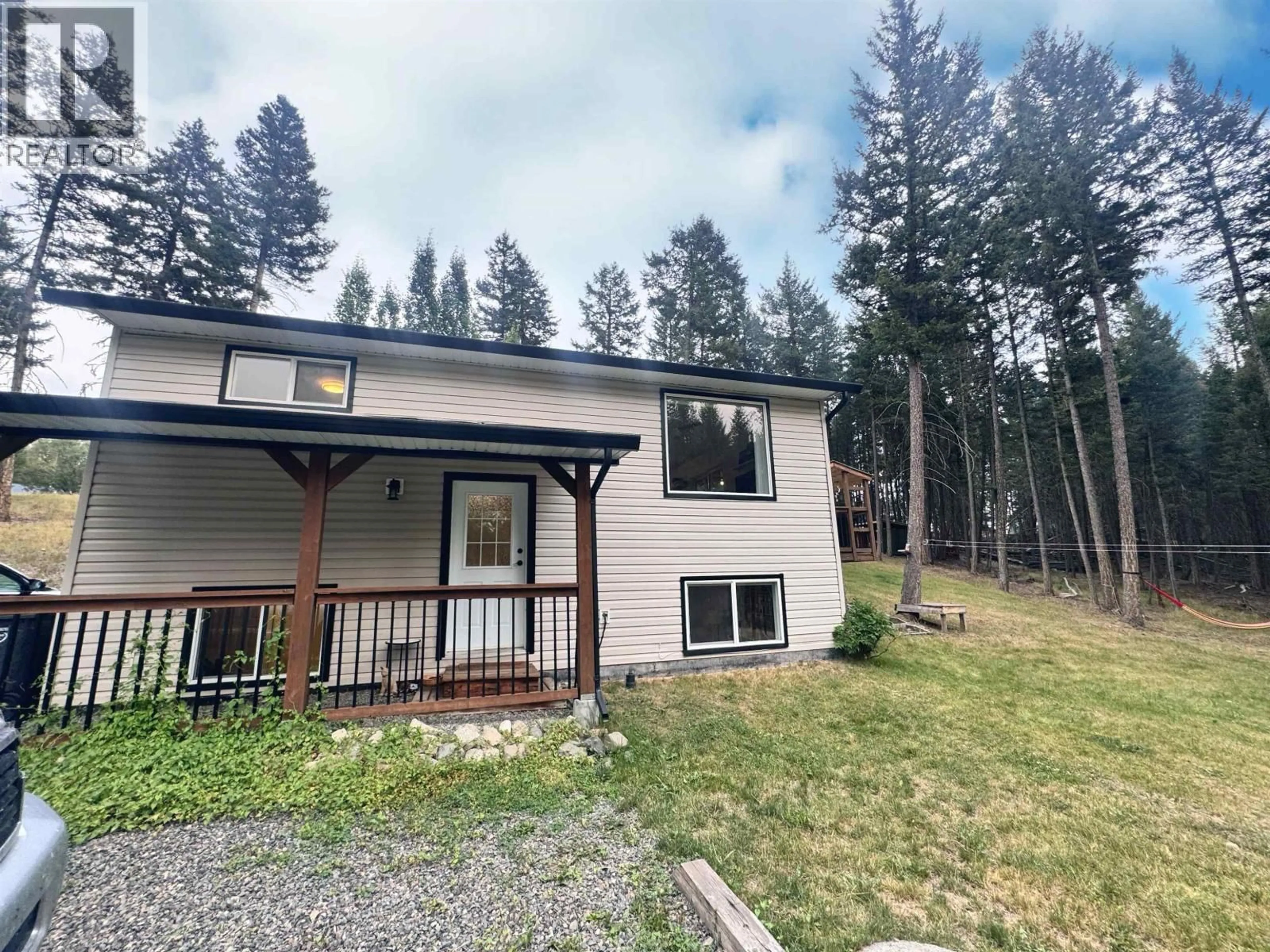 A pic from outside/outdoor area/front of a property/back of a property/a pic from drone, unknown for 4865 CUMSU PLACE, 108 Mile Ranch British Columbia V0K2Z0