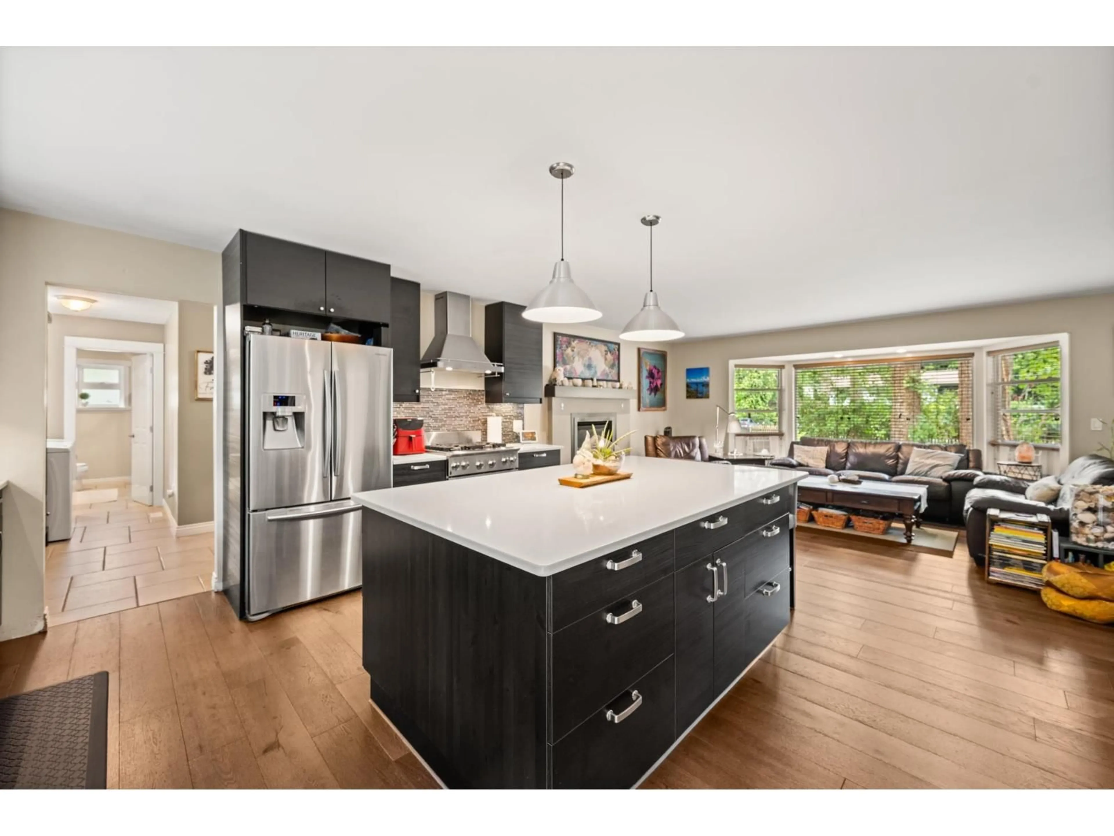 Open concept kitchen, wood/laminate floor for 20218 42A AVENUE, Langley British Columbia V3A3B4