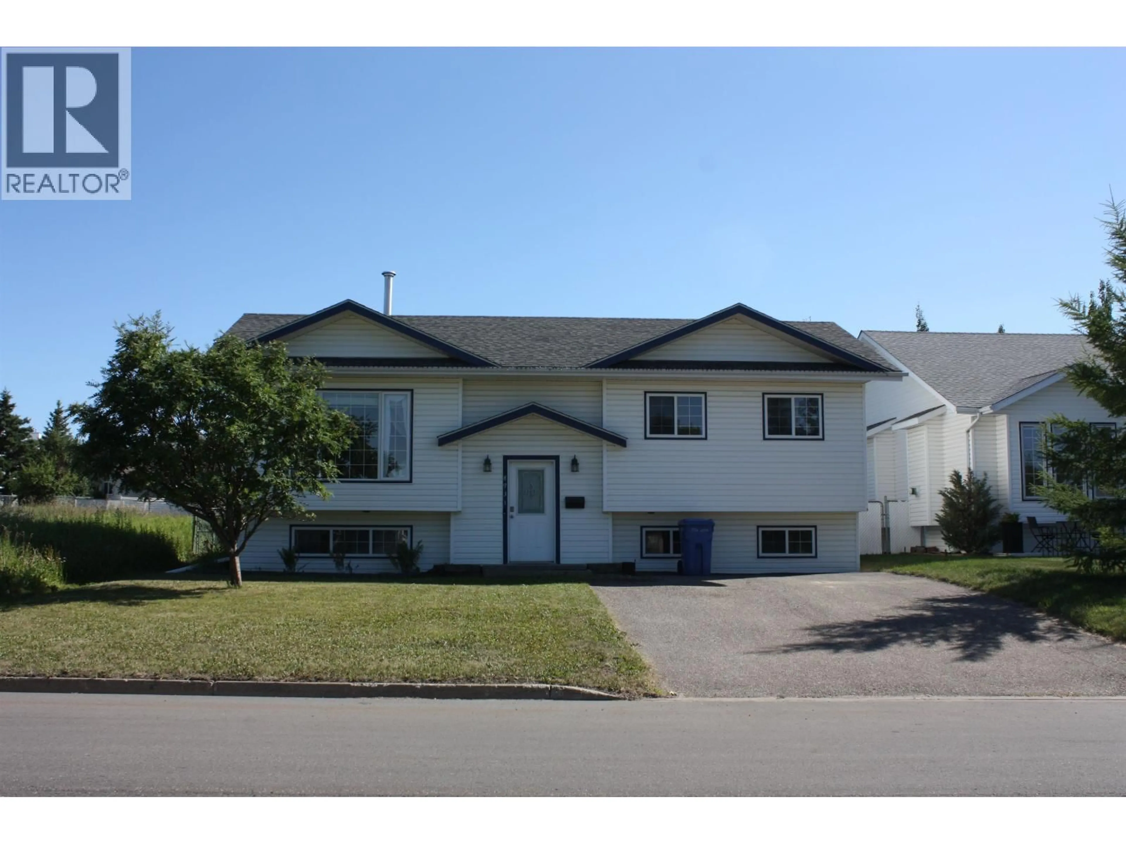 Home with vinyl exterior material, street for 8931 115 AVENUE, Fort St. John British Columbia V1J6J3
