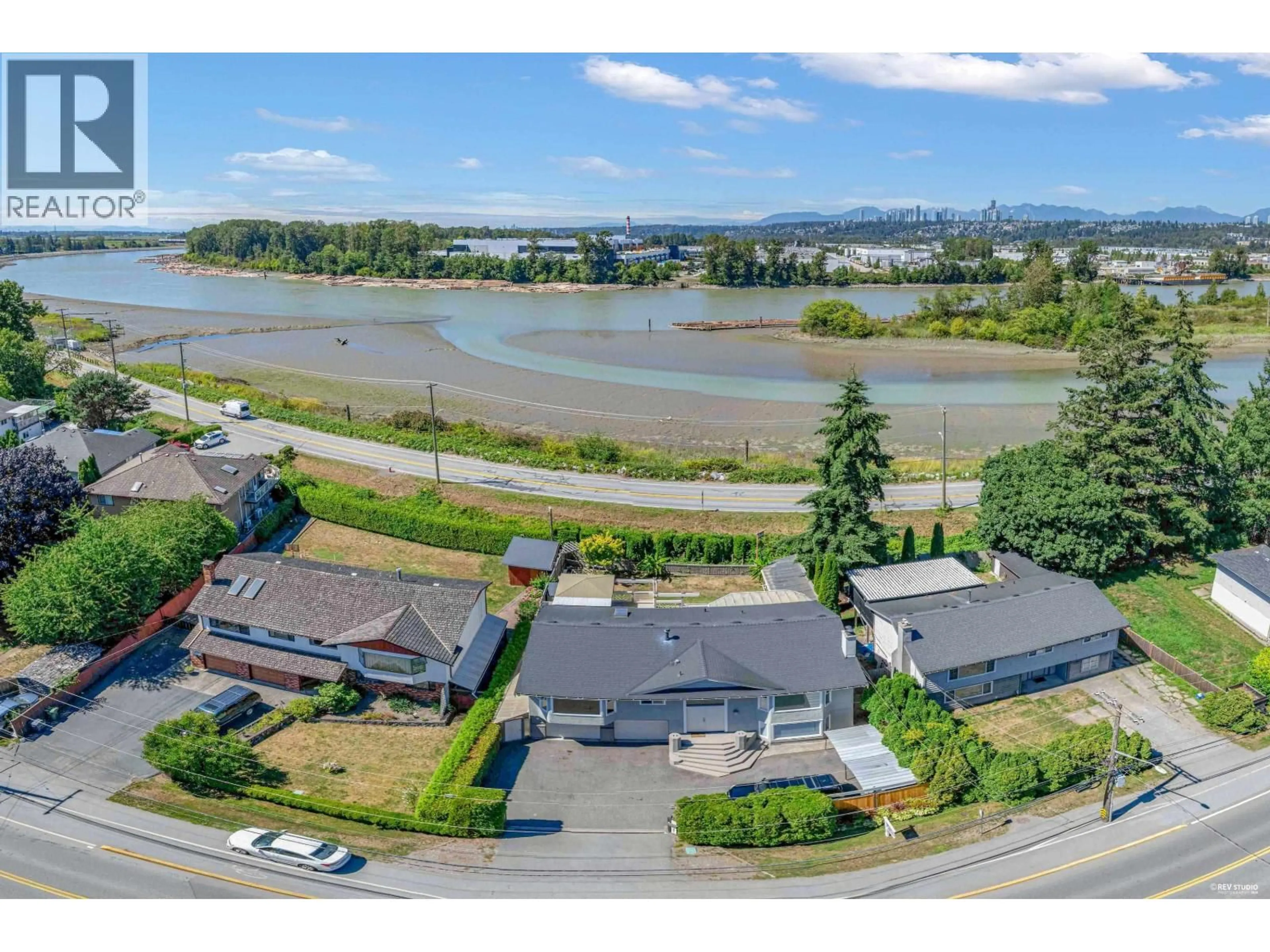 A pic from outside/outdoor area/front of a property/back of a property/a pic from drone, water/lake/river/ocean view for 23271 WESTMINSTER HIGHWAY, Richmond British Columbia V6V1C1