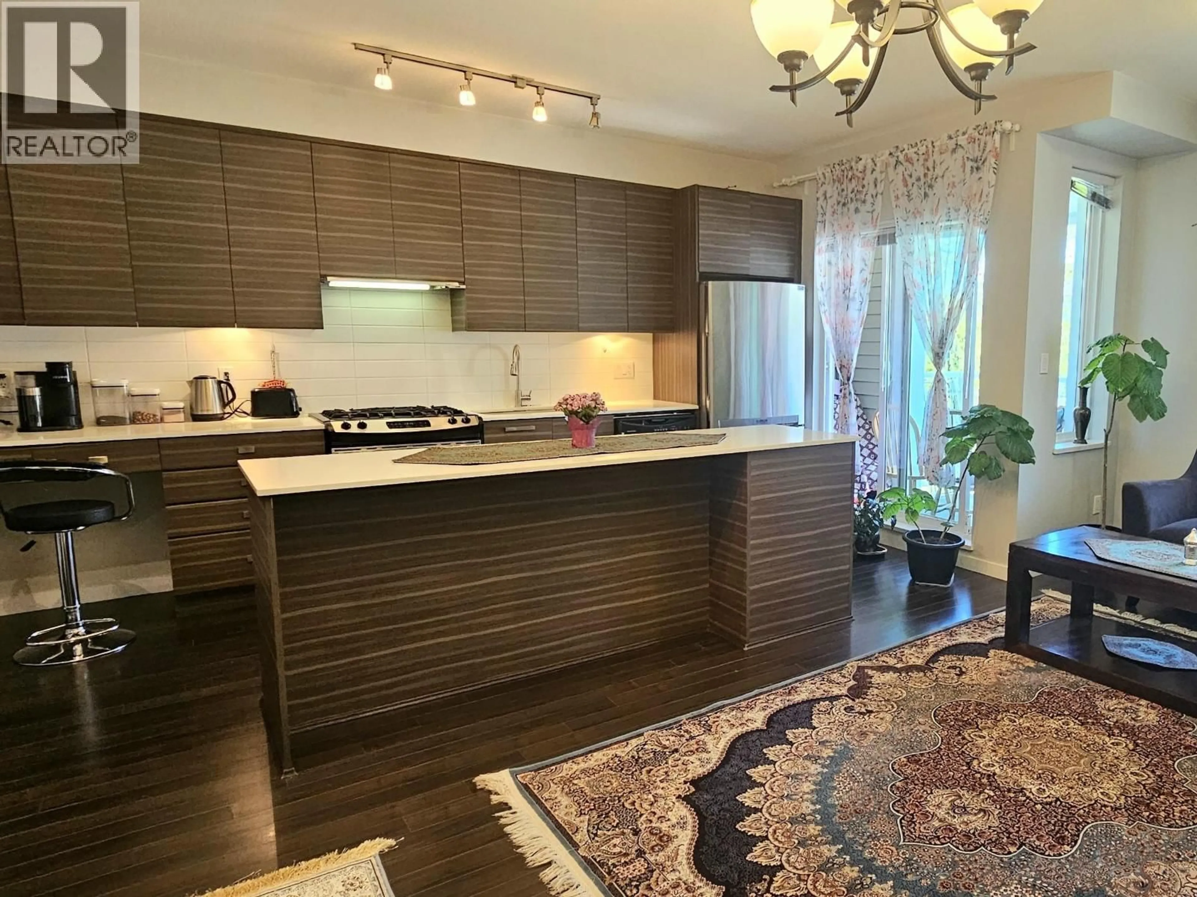 Open concept kitchen, wood/laminate floor for 47 - 6965 HASTINGS STREET, Burnaby British Columbia V5B4T8