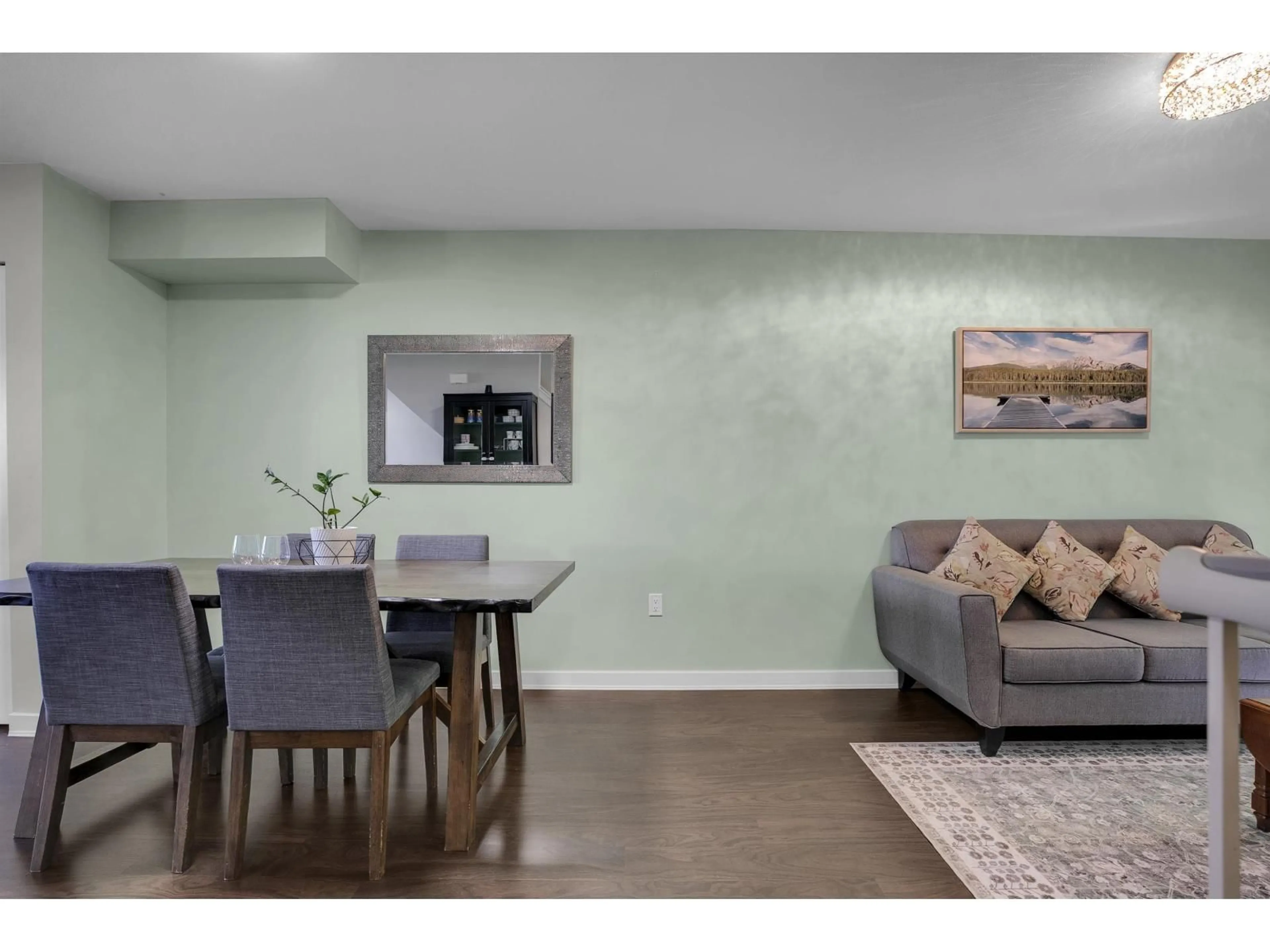 Living room with furniture, wood/laminate floor for 101 - 6671 121 STREET, Surrey British Columbia V3W1T9