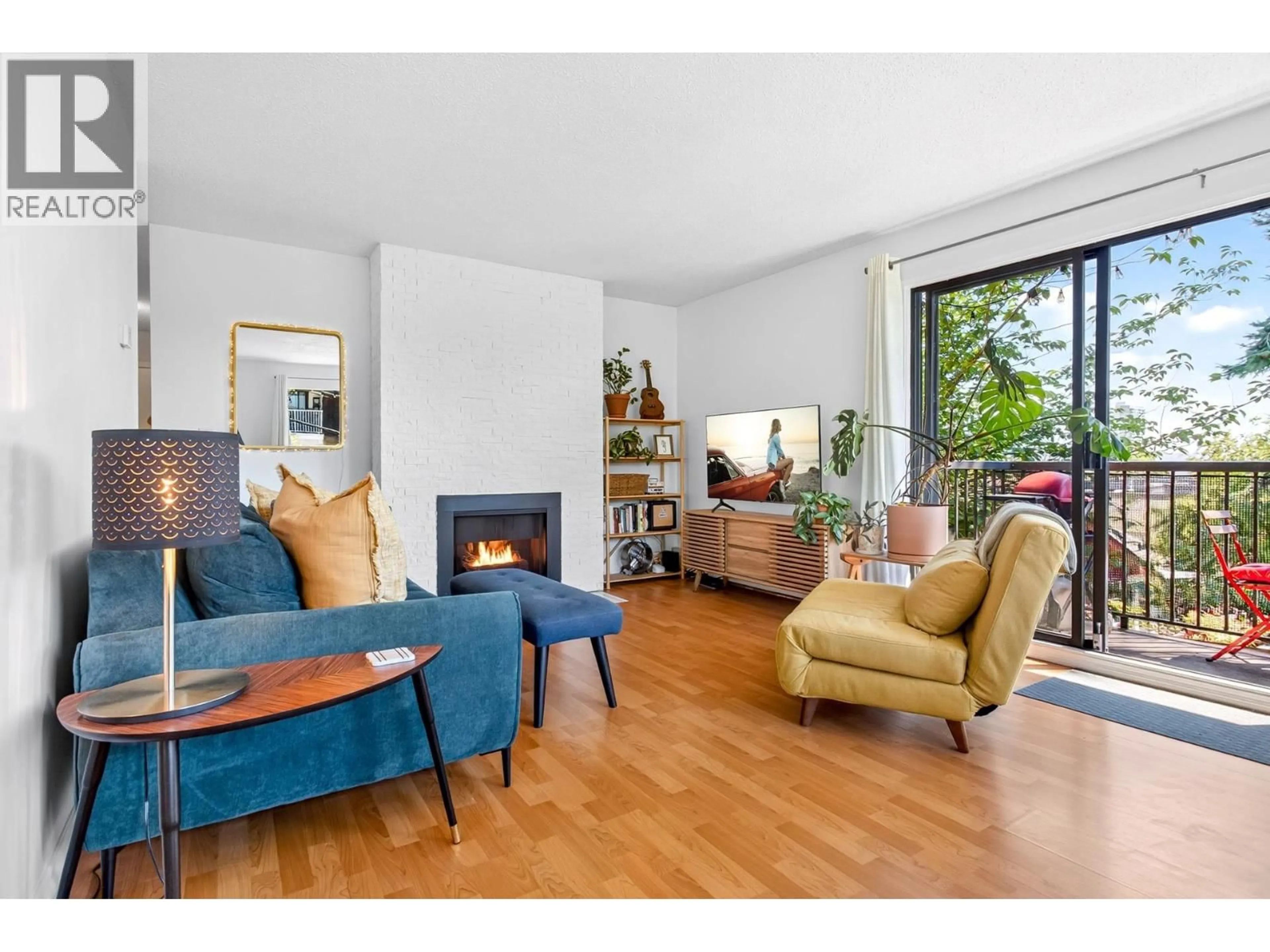 Living room with furniture, wood/laminate floor for 201 - 338 WARD STREET, New Westminster British Columbia V3L3N8