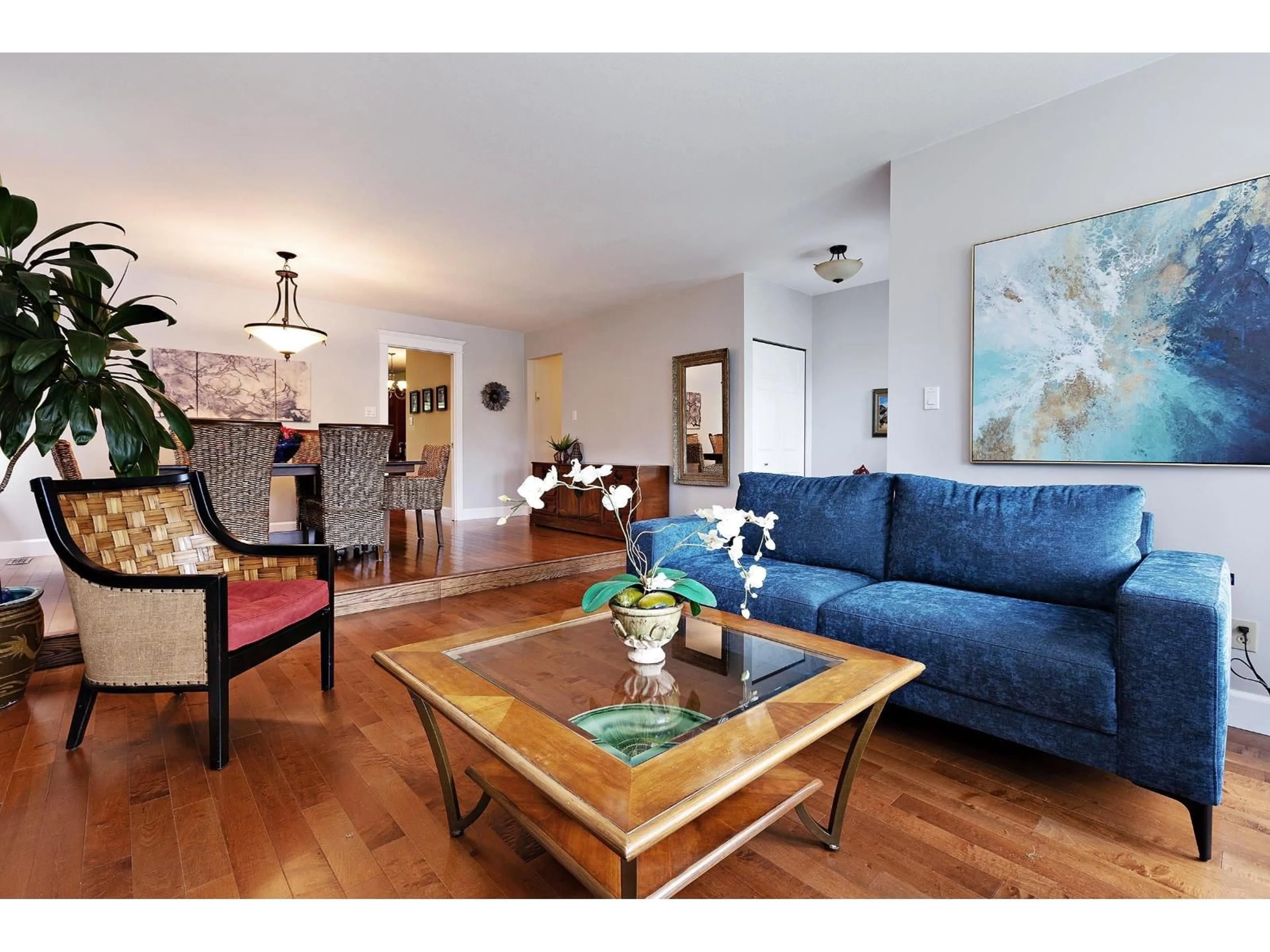 Living room with furniture, wood/laminate floor for 18289 58A AVENUE, Surrey British Columbia V3S7G1