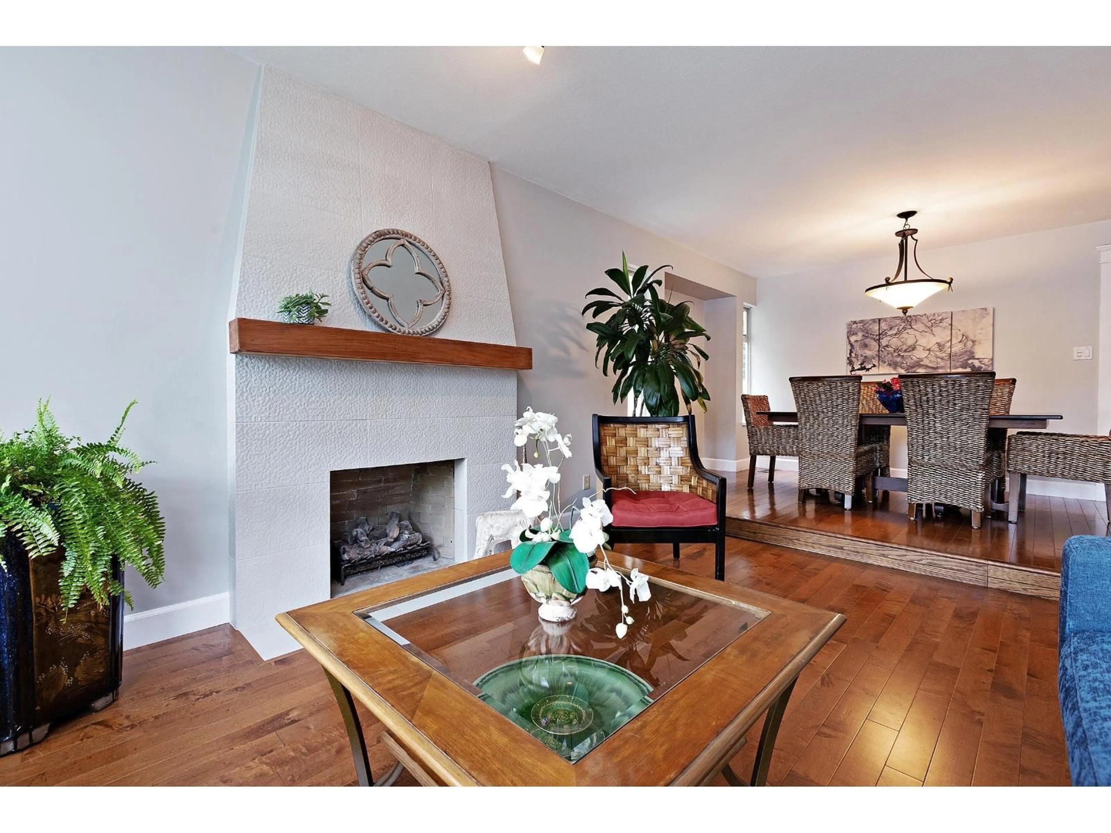 Living room with furniture, wood/laminate floor for 18289 58A AVENUE, Surrey British Columbia V3S7G1