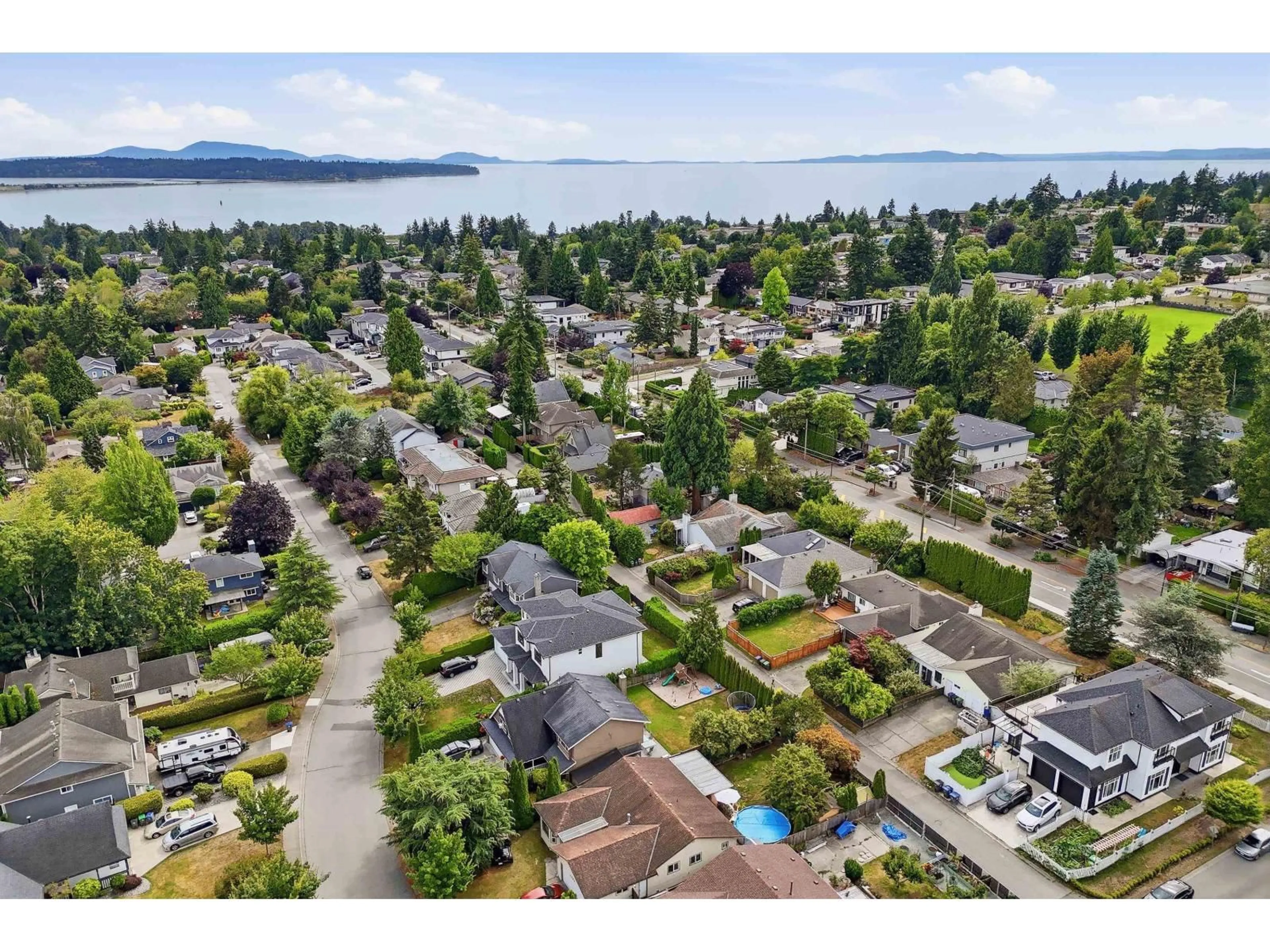 A pic from outside/outdoor area/front of a property/back of a property/a pic from drone, water/lake/river/ocean view for 1364 160 STREET, Surrey British Columbia V4A4W8