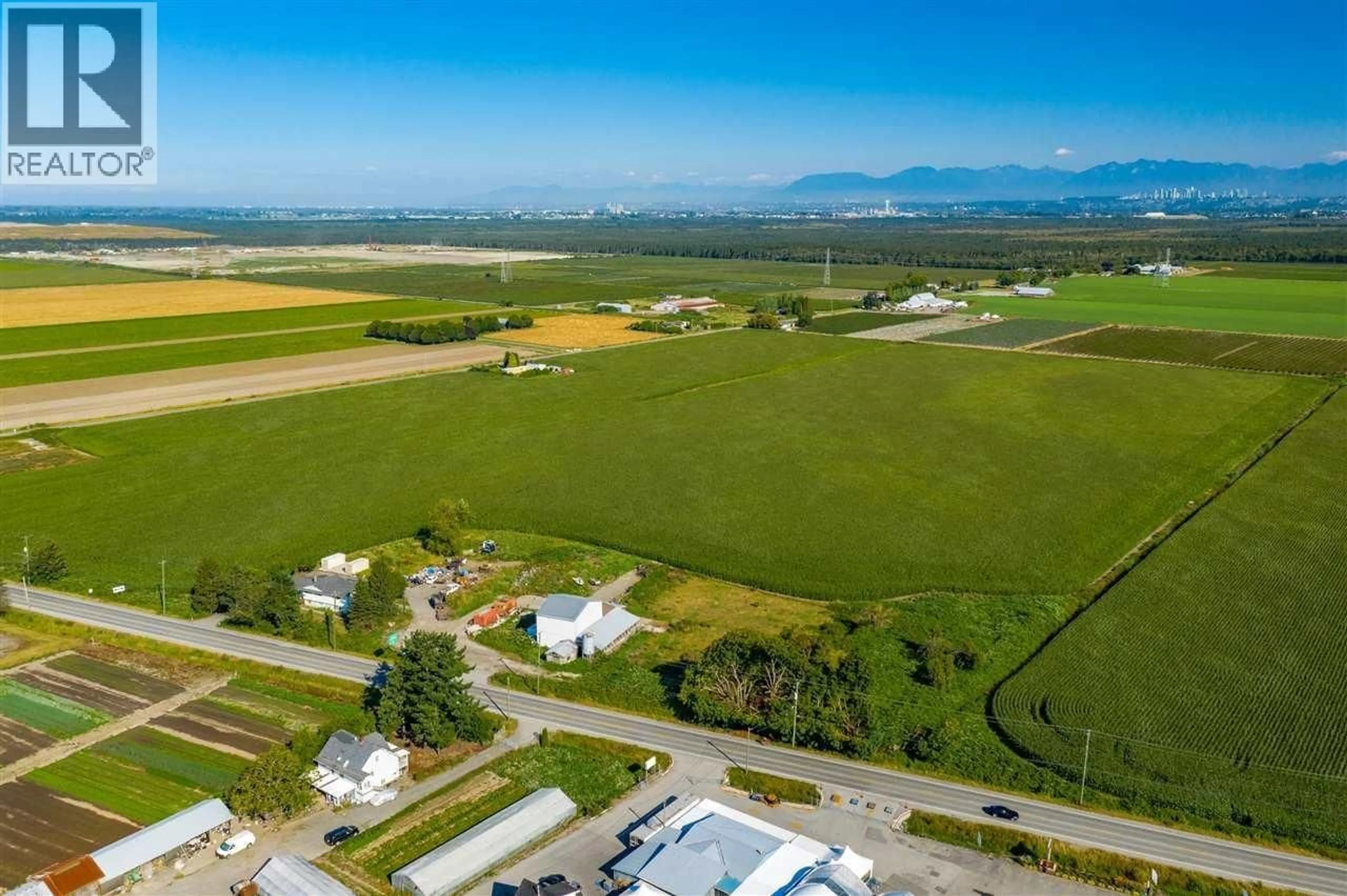 A pic from outside/outdoor area/front of a property/back of a property/a pic from drone, mountain view for 9727 LADNER TRUNK ROAD, Delta British Columbia V4G1K2