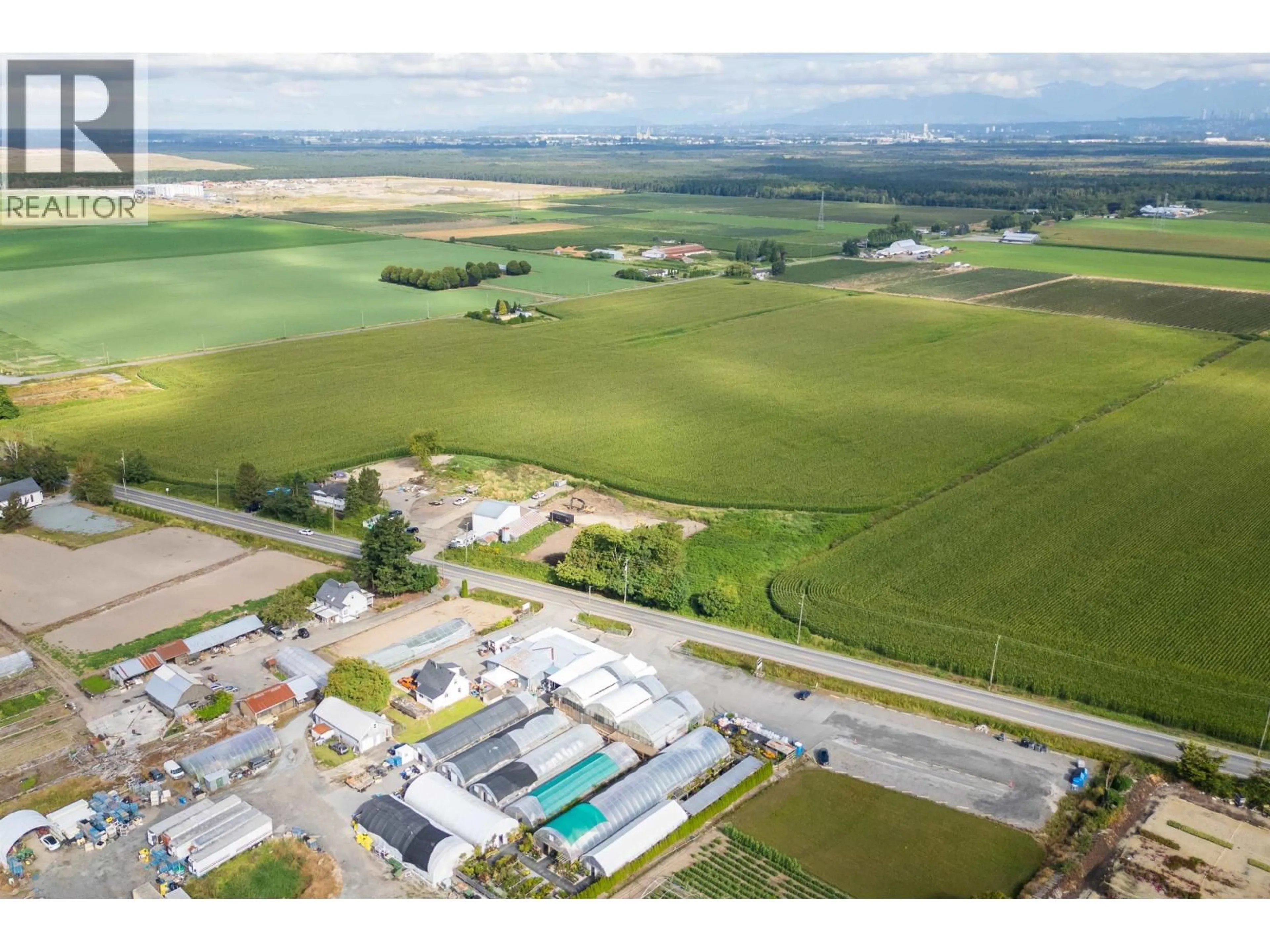 A pic from outside/outdoor area/front of a property/back of a property/a pic from drone, unknown for 9727 LADNER TRUNK ROAD, Delta British Columbia V4G1K2