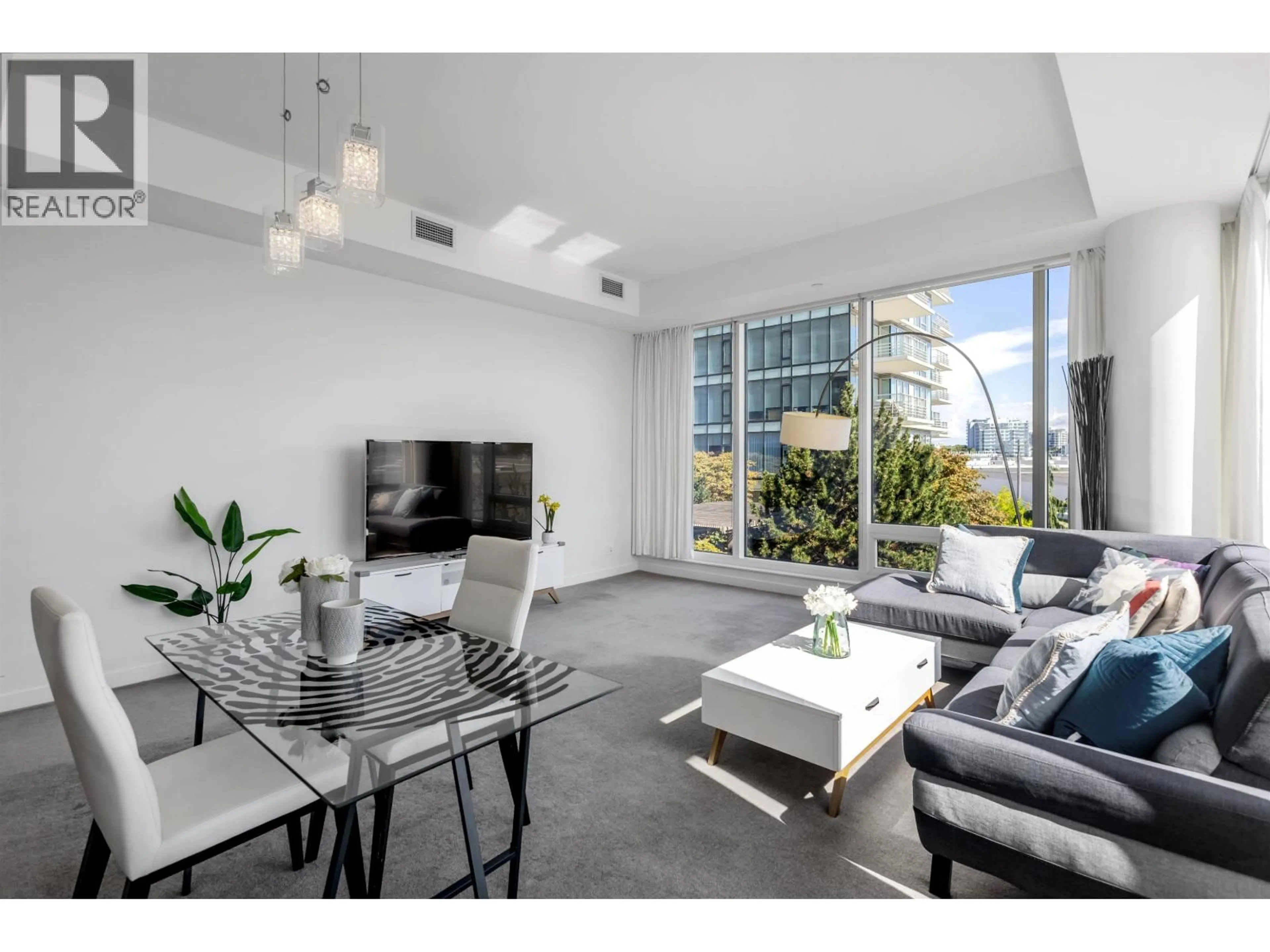 Living room with furniture, unknown for 306 - 5177 BRIGHOUSE WAY, Richmond British Columbia V7C0A7
