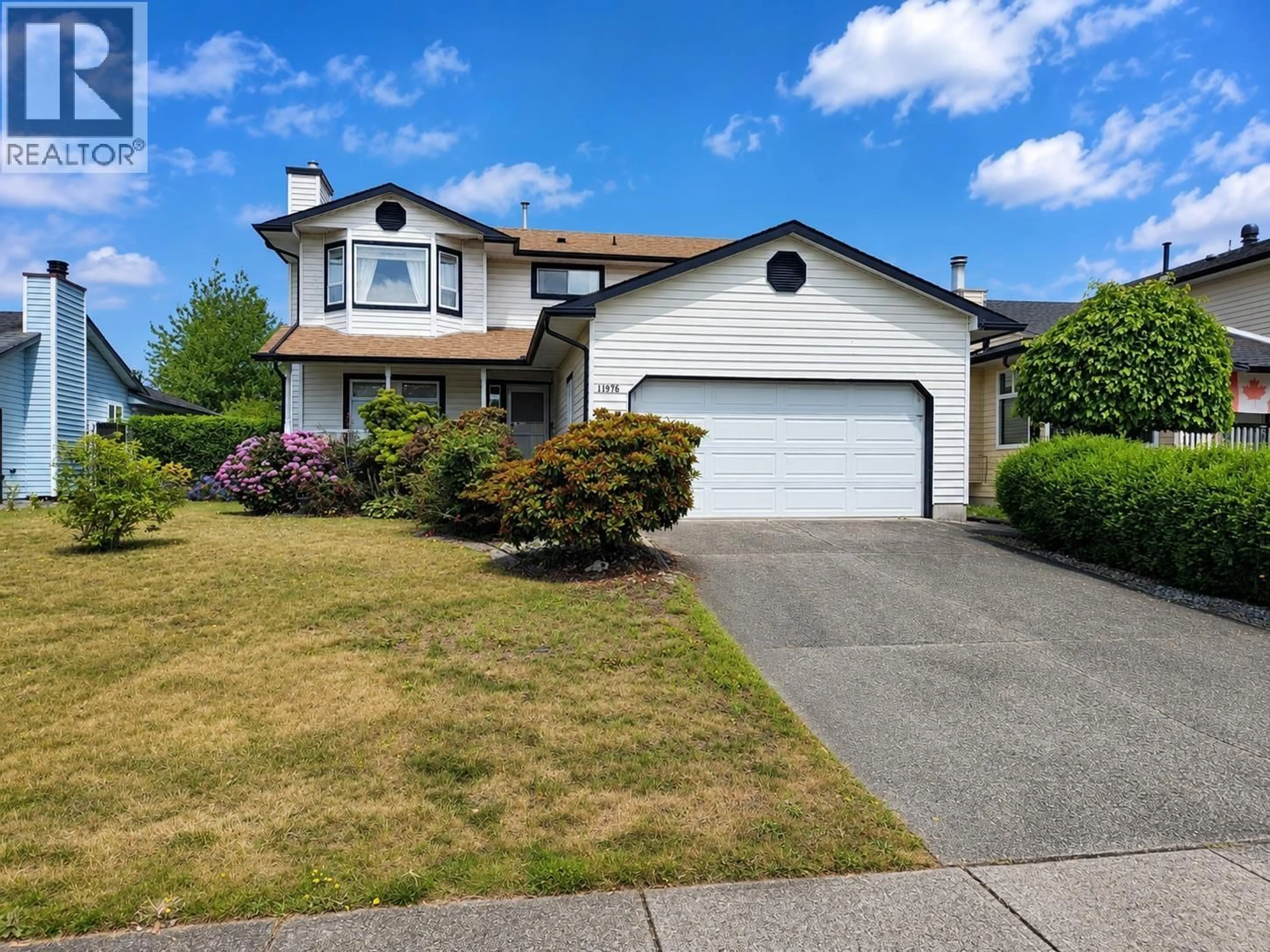 Home with vinyl exterior material, street for 11976 MEADOWLARK DRIVE, Maple Ridge British Columbia V2X9L9
