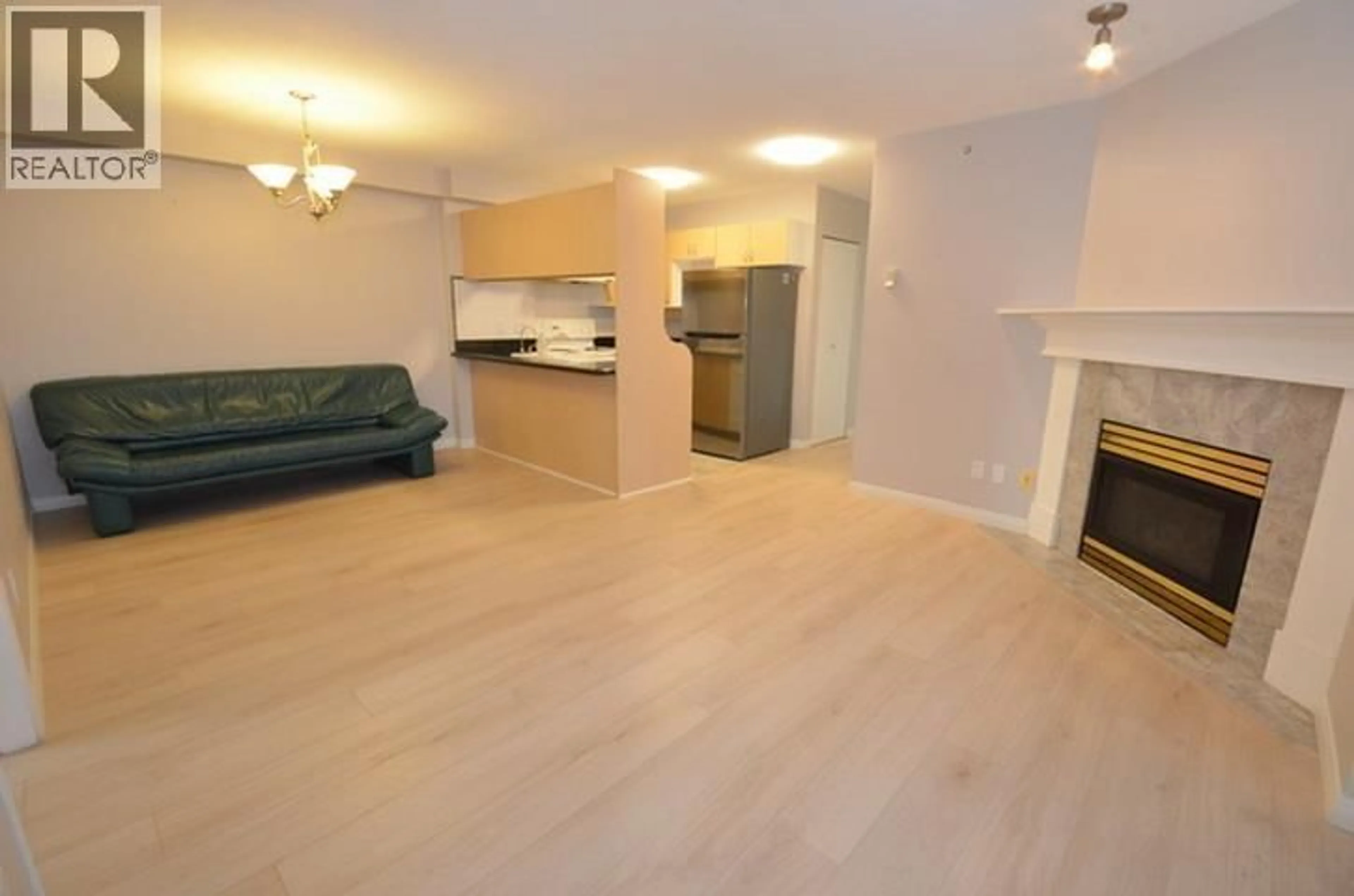 Living room with furniture, wood/laminate floor for 1201 - 6611 COONEY ROAD, Richmond British Columbia V6Y4C5