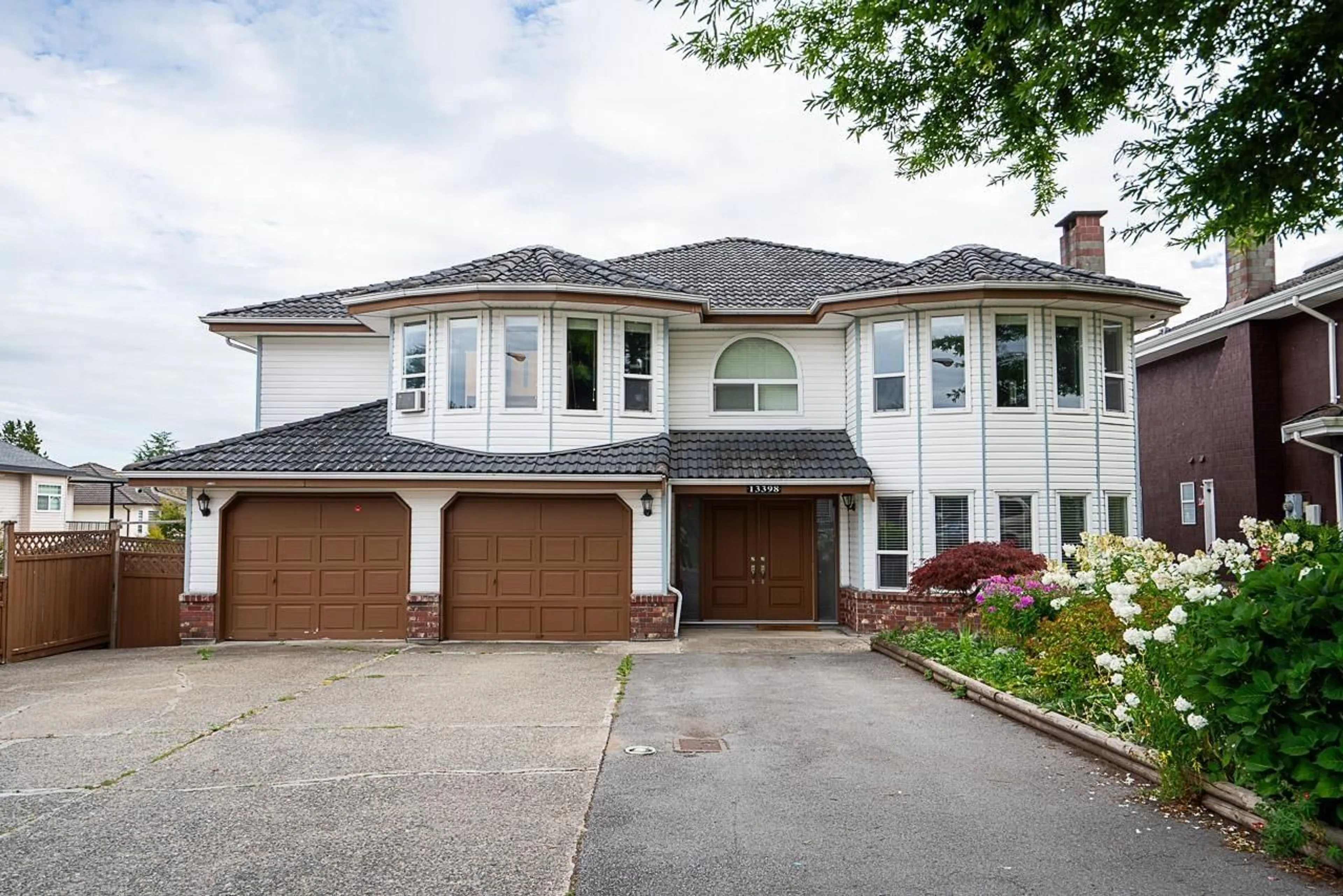 Home with vinyl exterior material, street for 13398 89 AVENUE, Surrey British Columbia V3V7W1