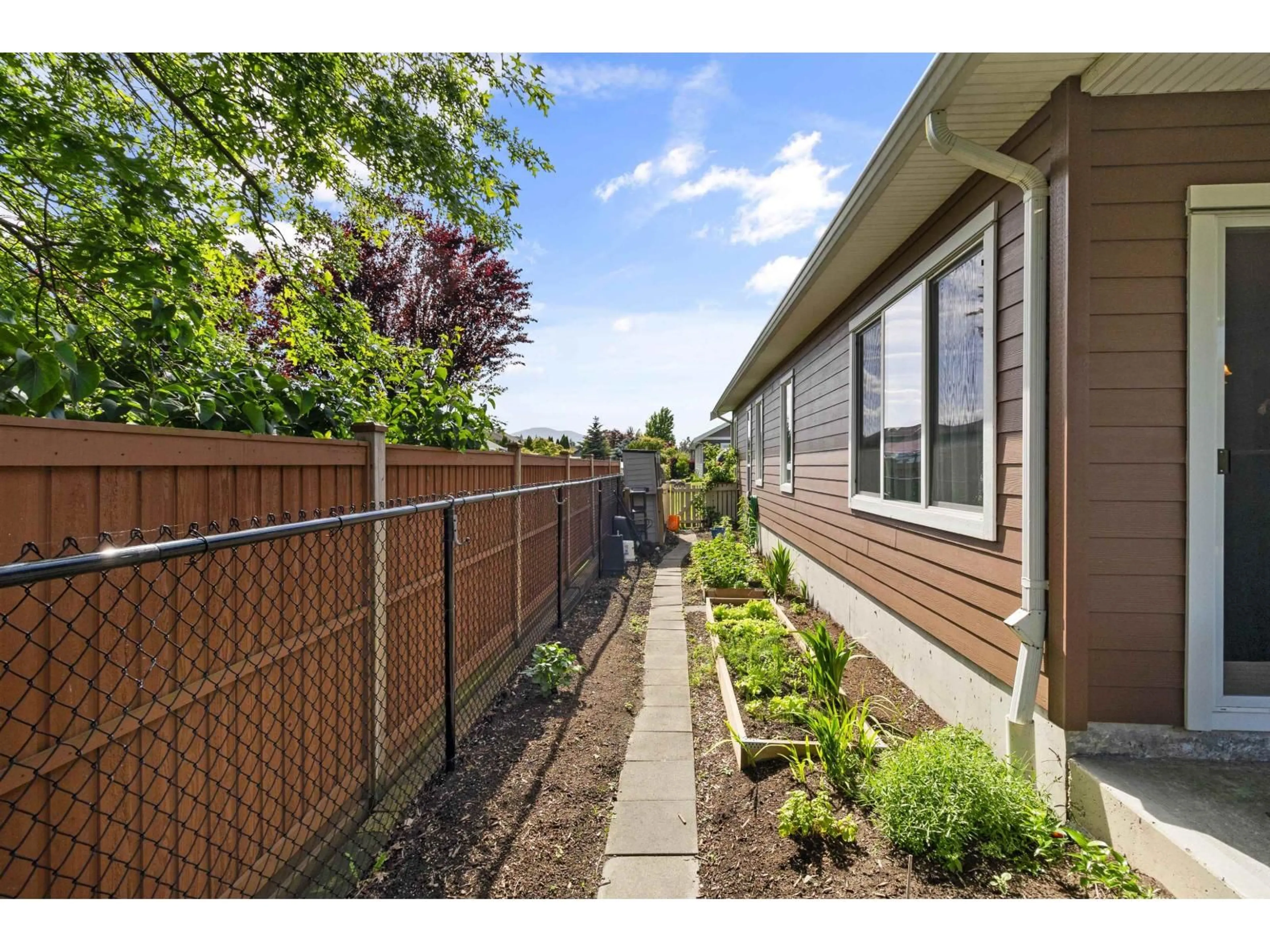A pic from outside/outdoor area/front of a property/back of a property/a pic from drone, street for 64 - 7600 CHILLIWACK RIVER ROAD, Chilliwack British Columbia V2R3Z6