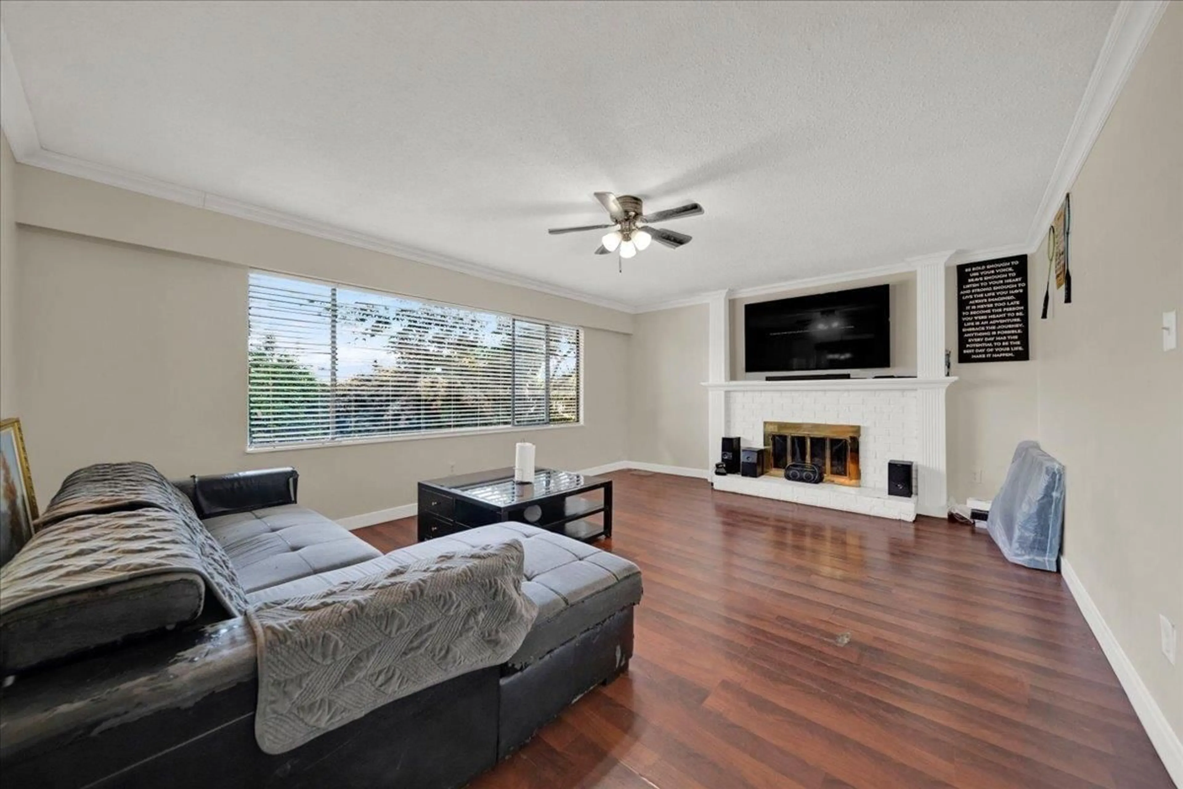 Living room with furniture, wood/laminate floor for 8531 116A STREET, Delta British Columbia V4C5Z5