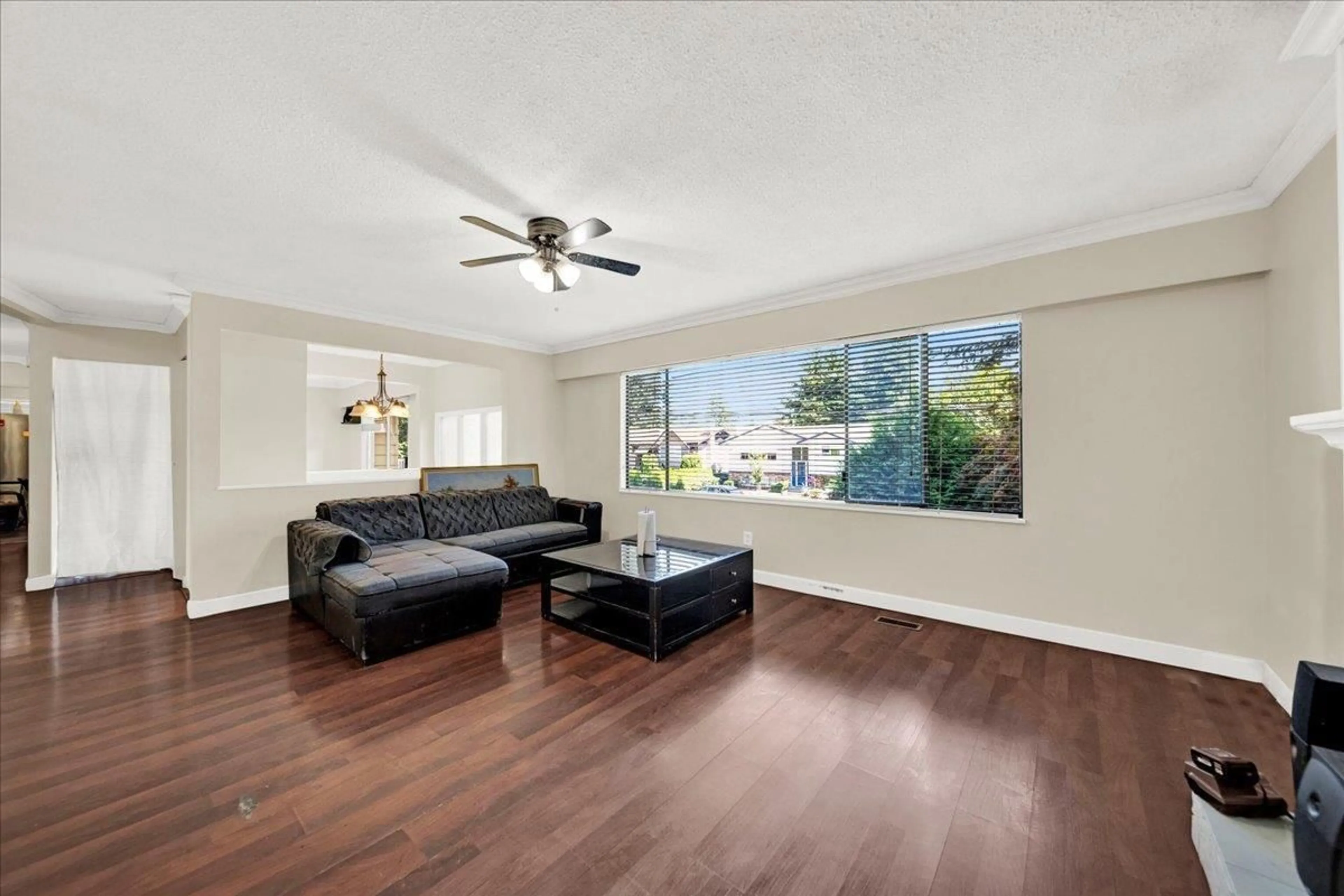 Living room with furniture, wood/laminate floor for 8531 116A STREET, Delta British Columbia V4C5Z5