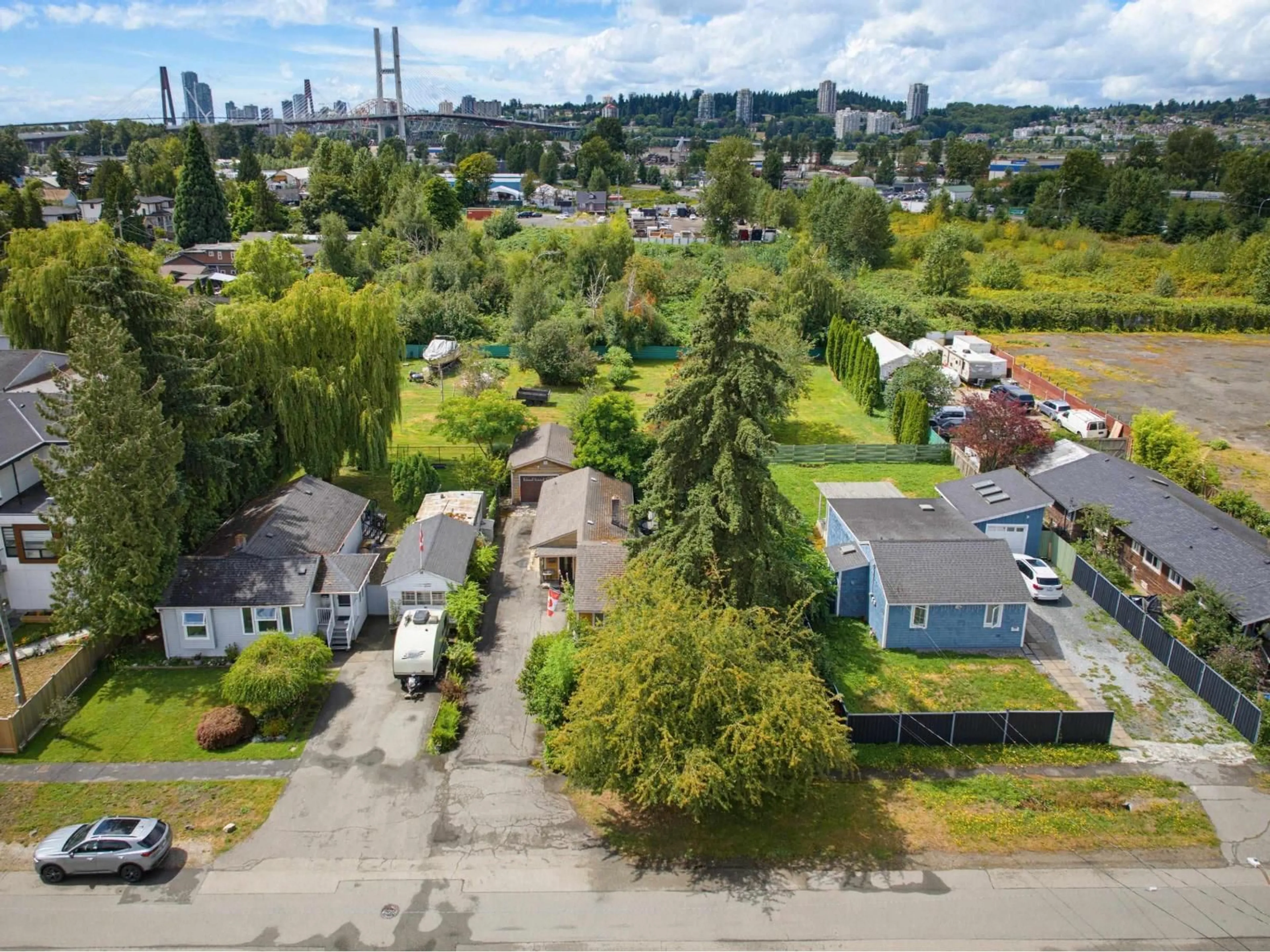 A pic from outside/outdoor area/front of a property/back of a property/a pic from drone, street for 11447 125A STREET, Surrey British Columbia V3V5A6