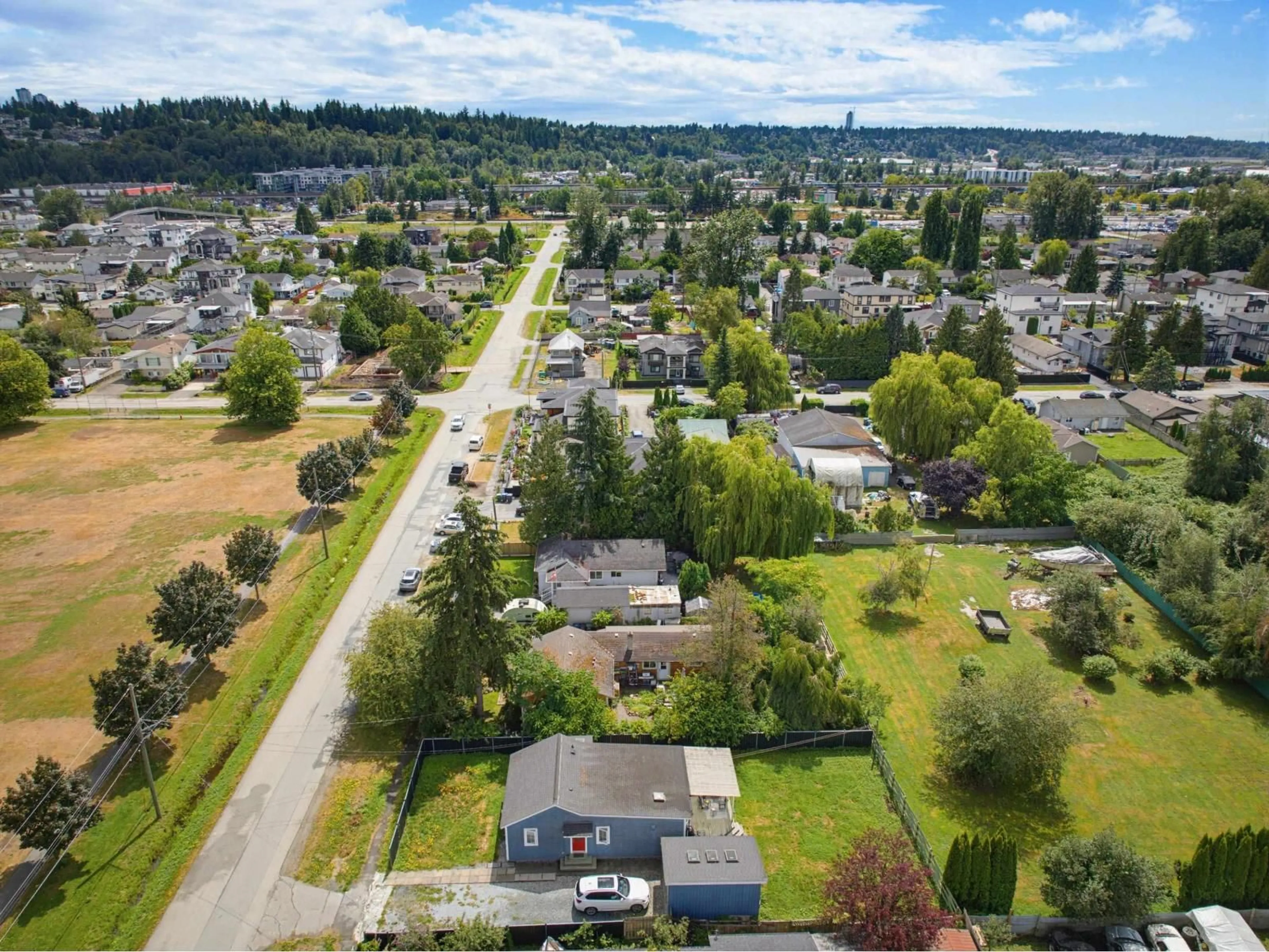 A pic from outside/outdoor area/front of a property/back of a property/a pic from drone, street for 11447 125A STREET, Surrey British Columbia V3V5A6