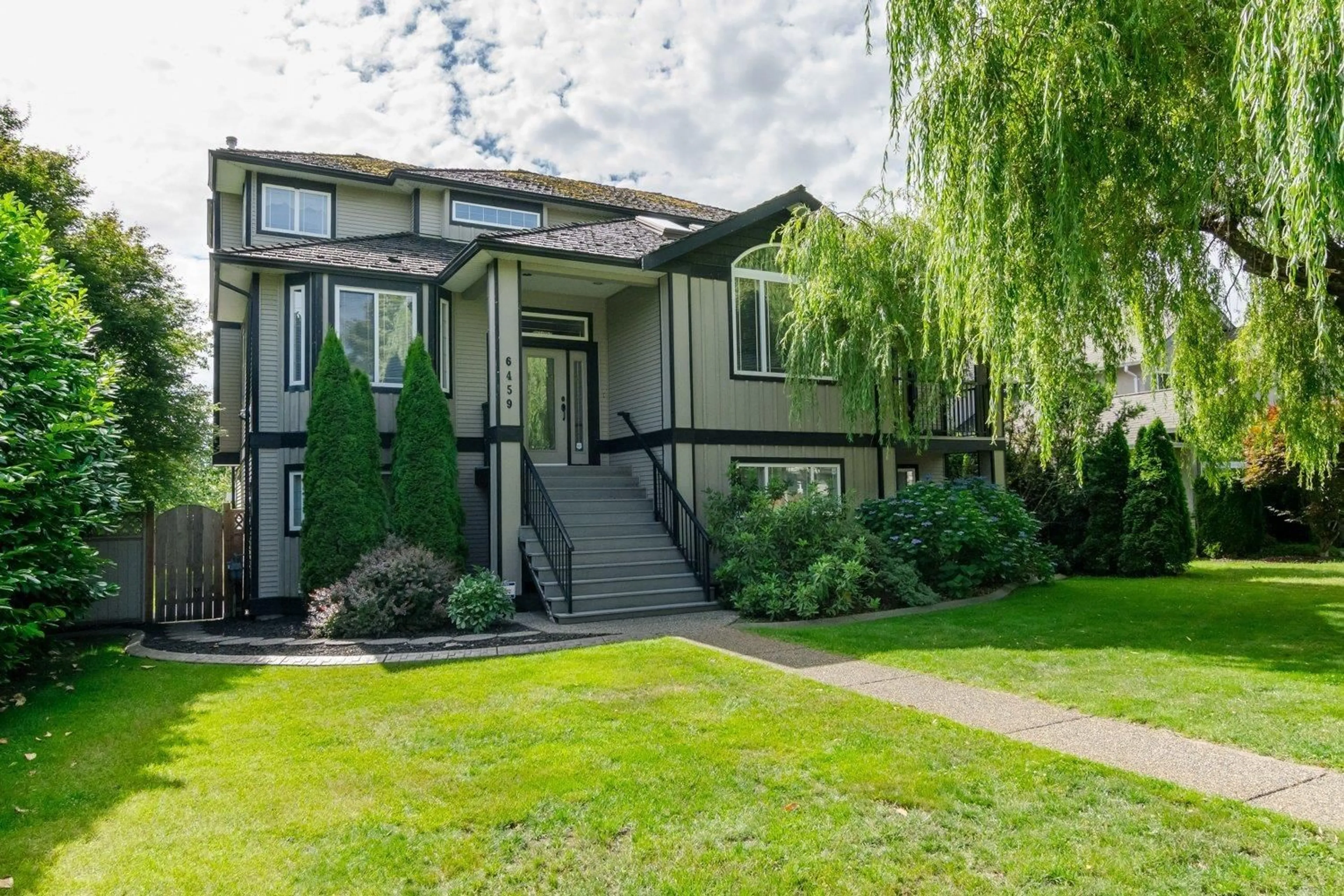 Home with vinyl exterior material, street for 6459 184 STREET, Surrey British Columbia V3S1G5