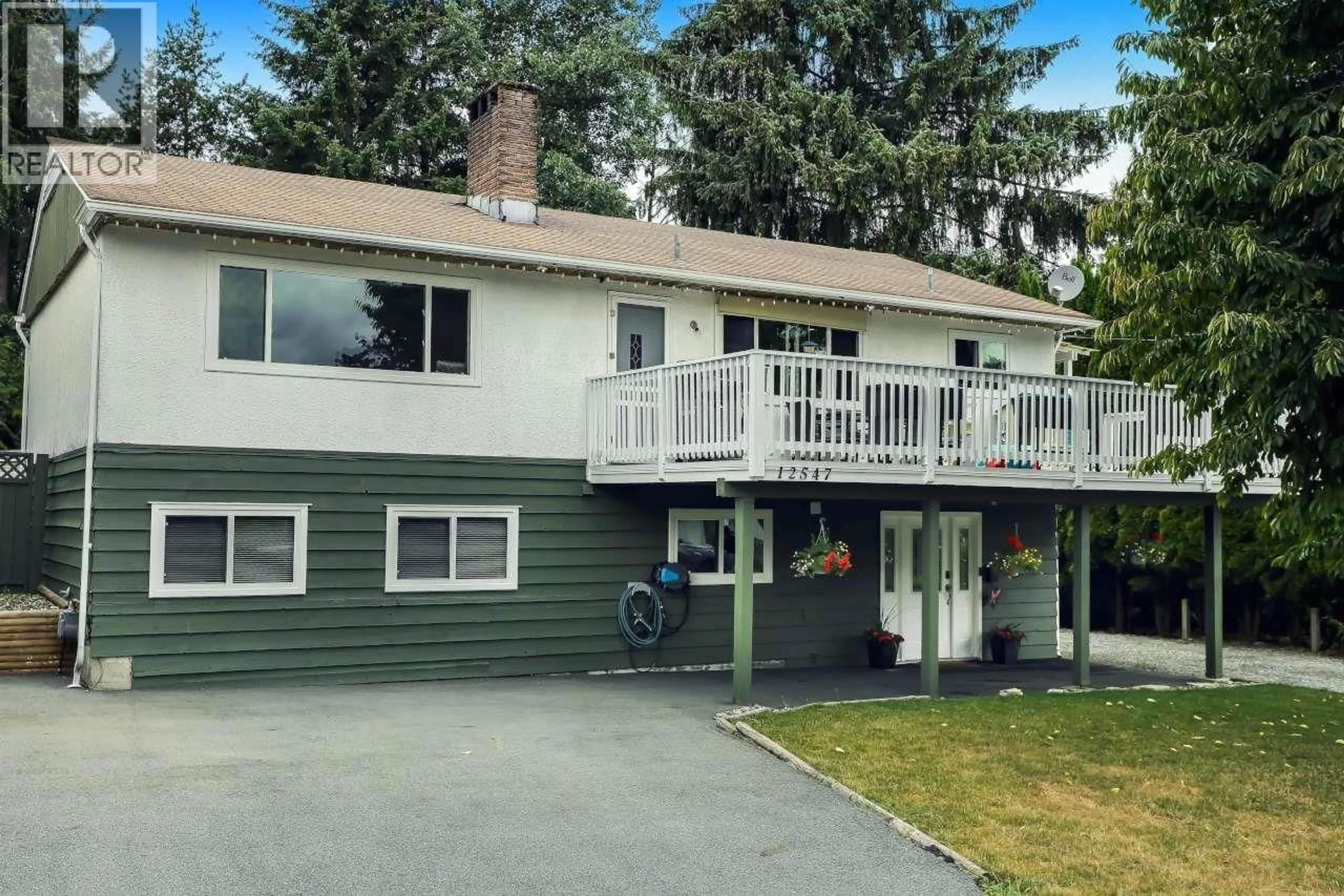 Home with vinyl exterior material, street for 12547 BLACKSTOCK STREET, Maple Ridge British Columbia V2X5N7