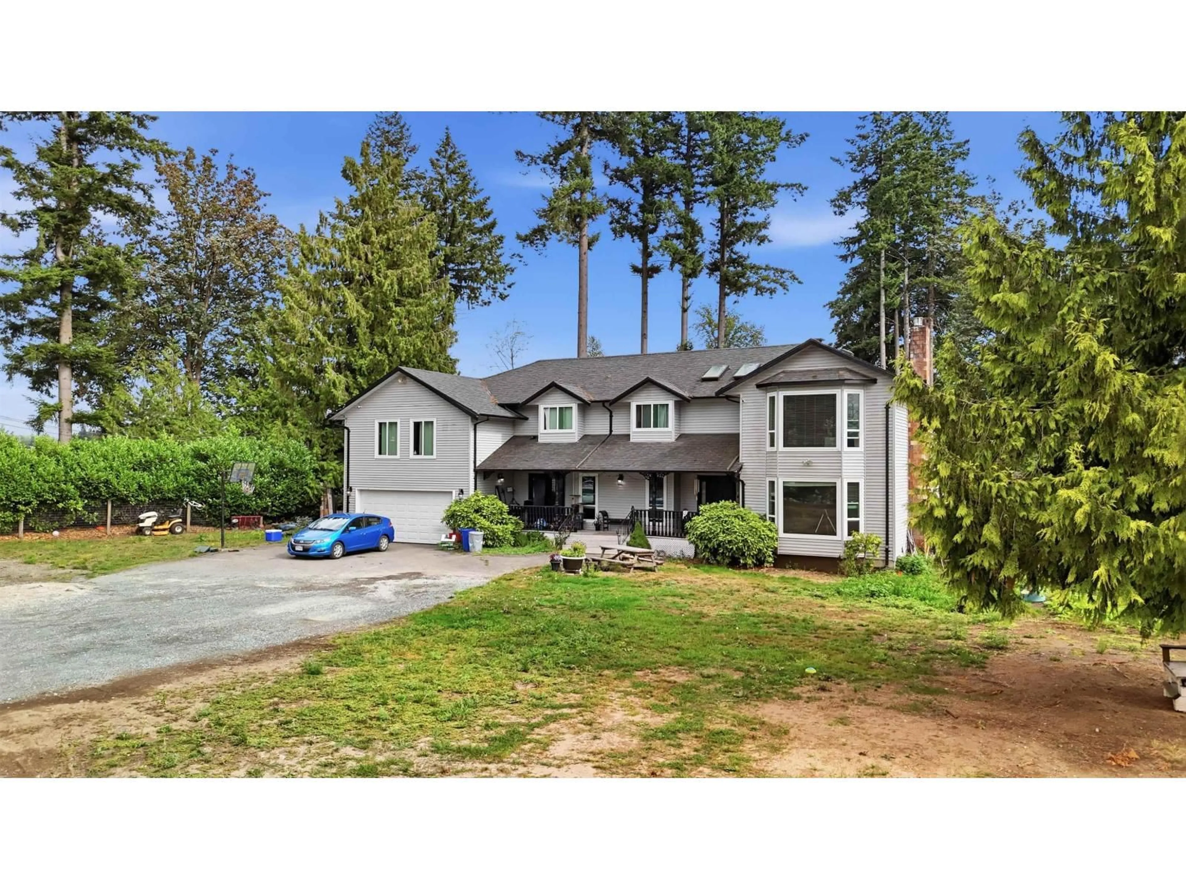 A pic from outside/outdoor area/front of a property/back of a property/a pic from drone, street for 23788 72 AVENUE, Langley British Columbia V1M3K9