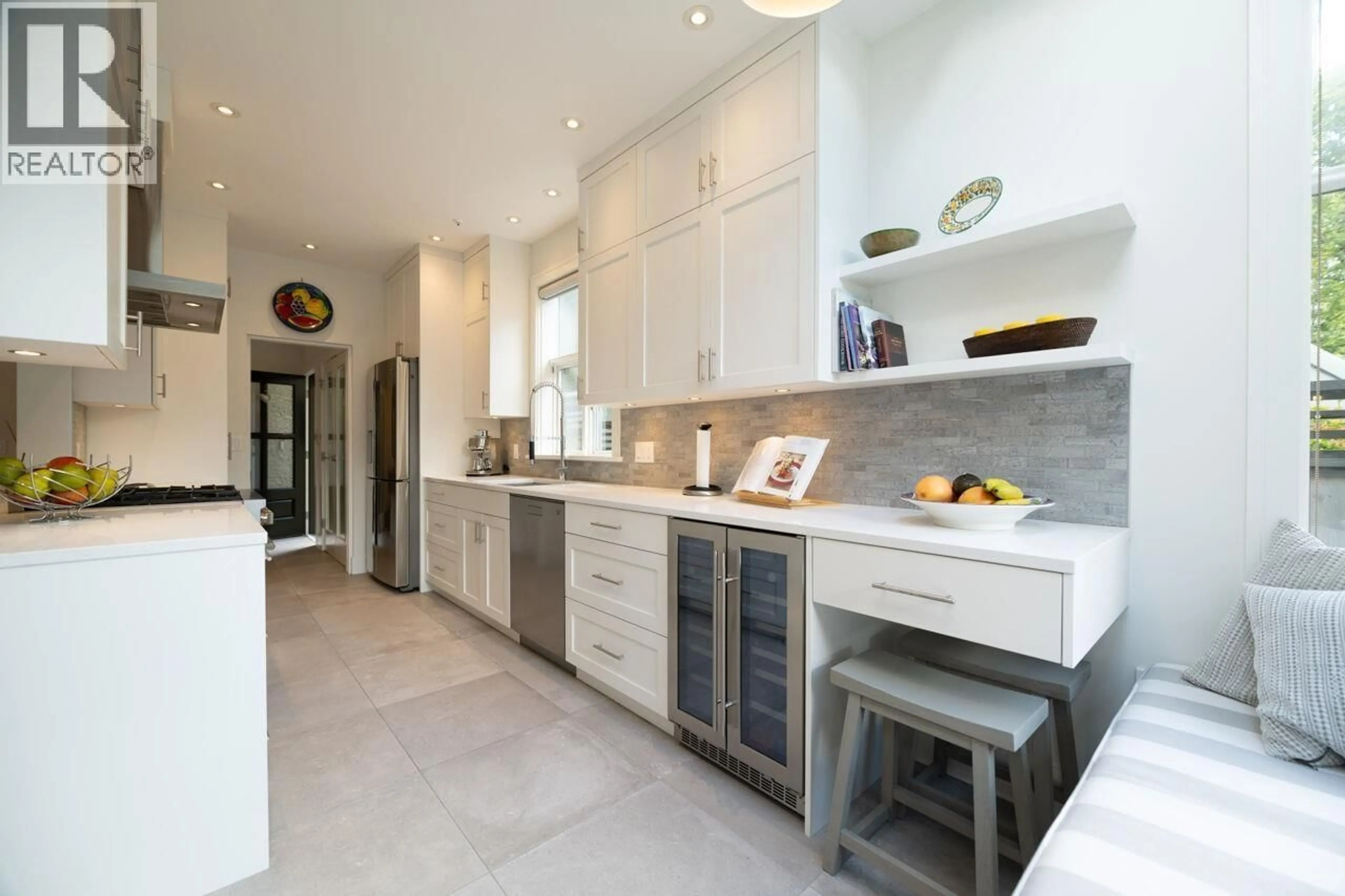 Contemporary kitchen, ceramic/tile floor for 1989 13TH AVENUE, Vancouver British Columbia V6H2H5