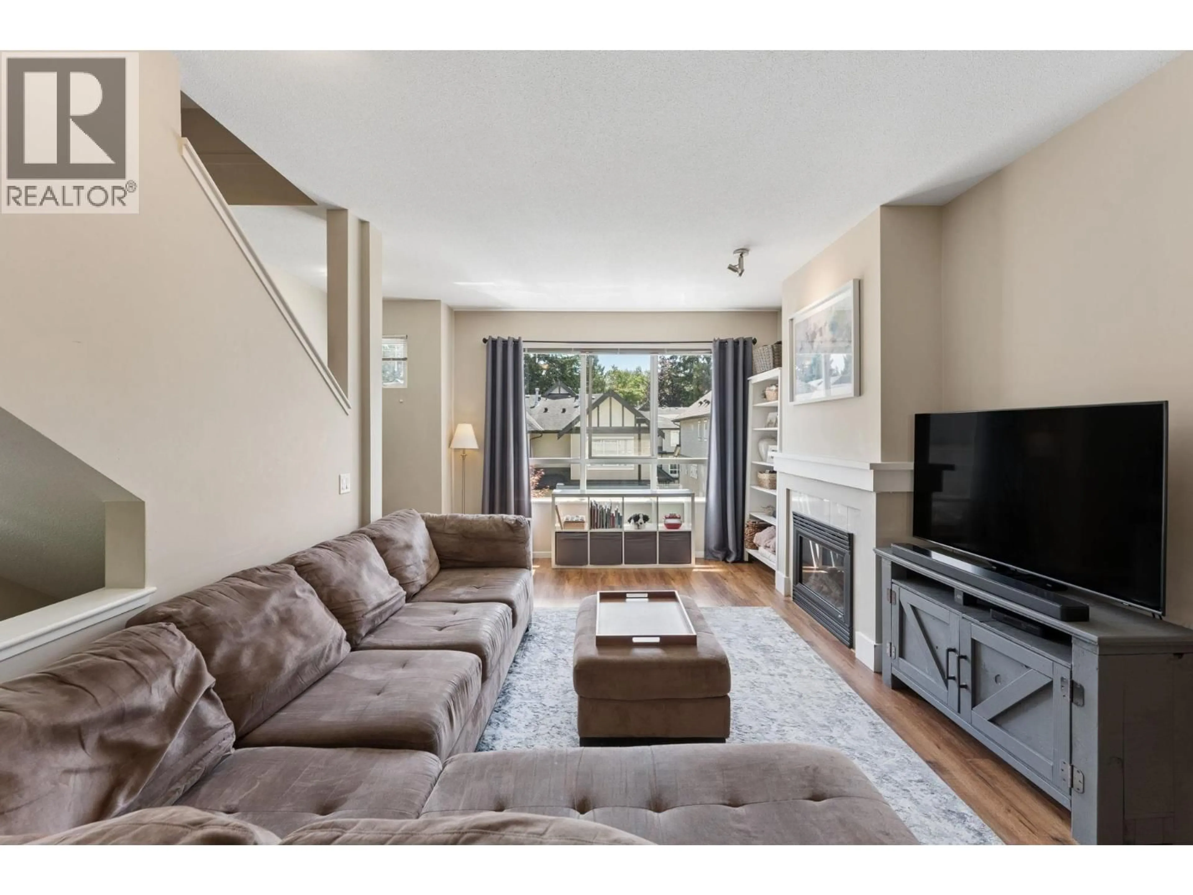 Living room with furniture, unknown for 110 - 9088 HALSTON COURT, Burnaby British Columbia V3N0A7