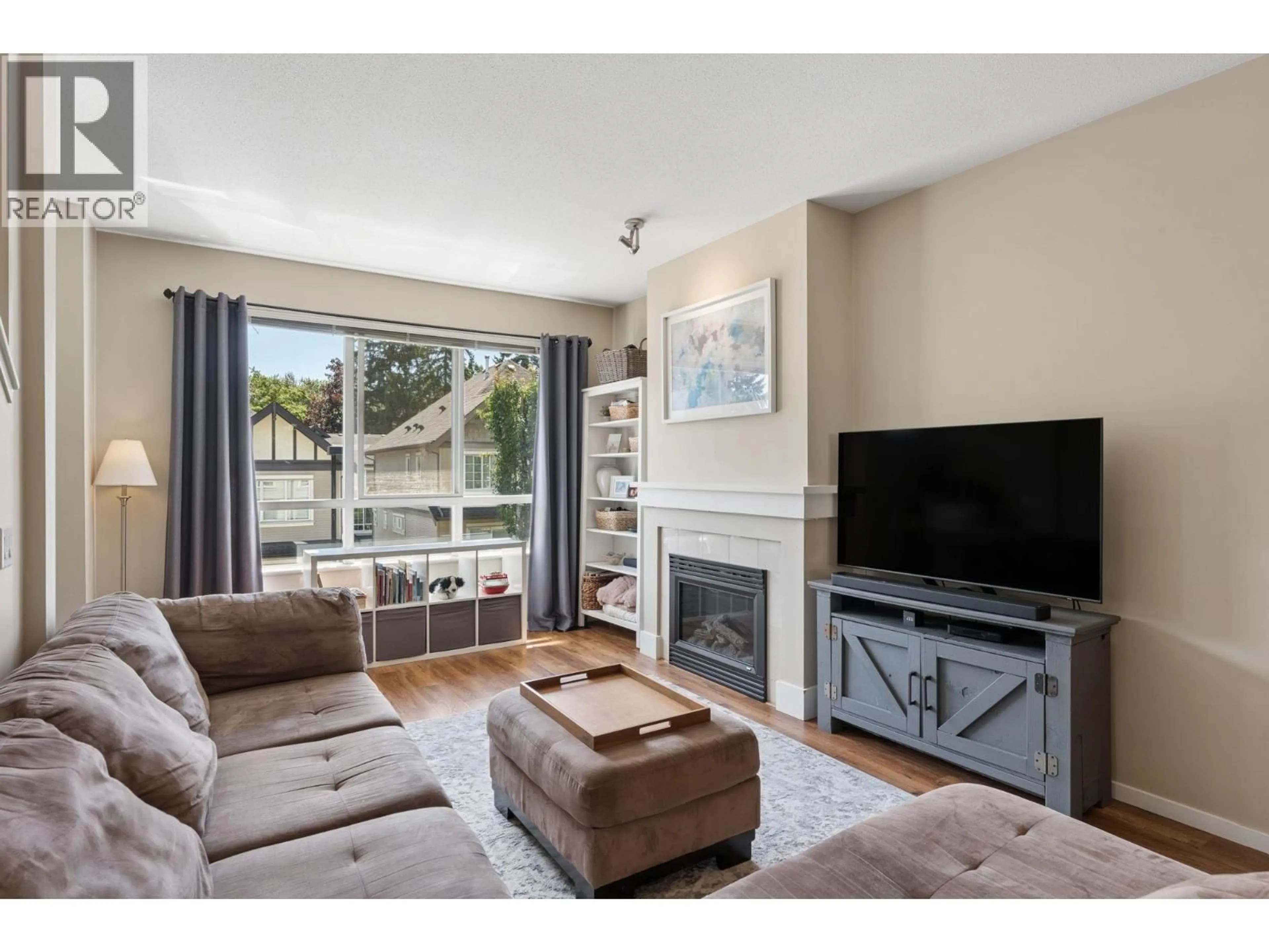 Living room with furniture, unknown for 110 - 9088 HALSTON COURT, Burnaby British Columbia V3N0A7