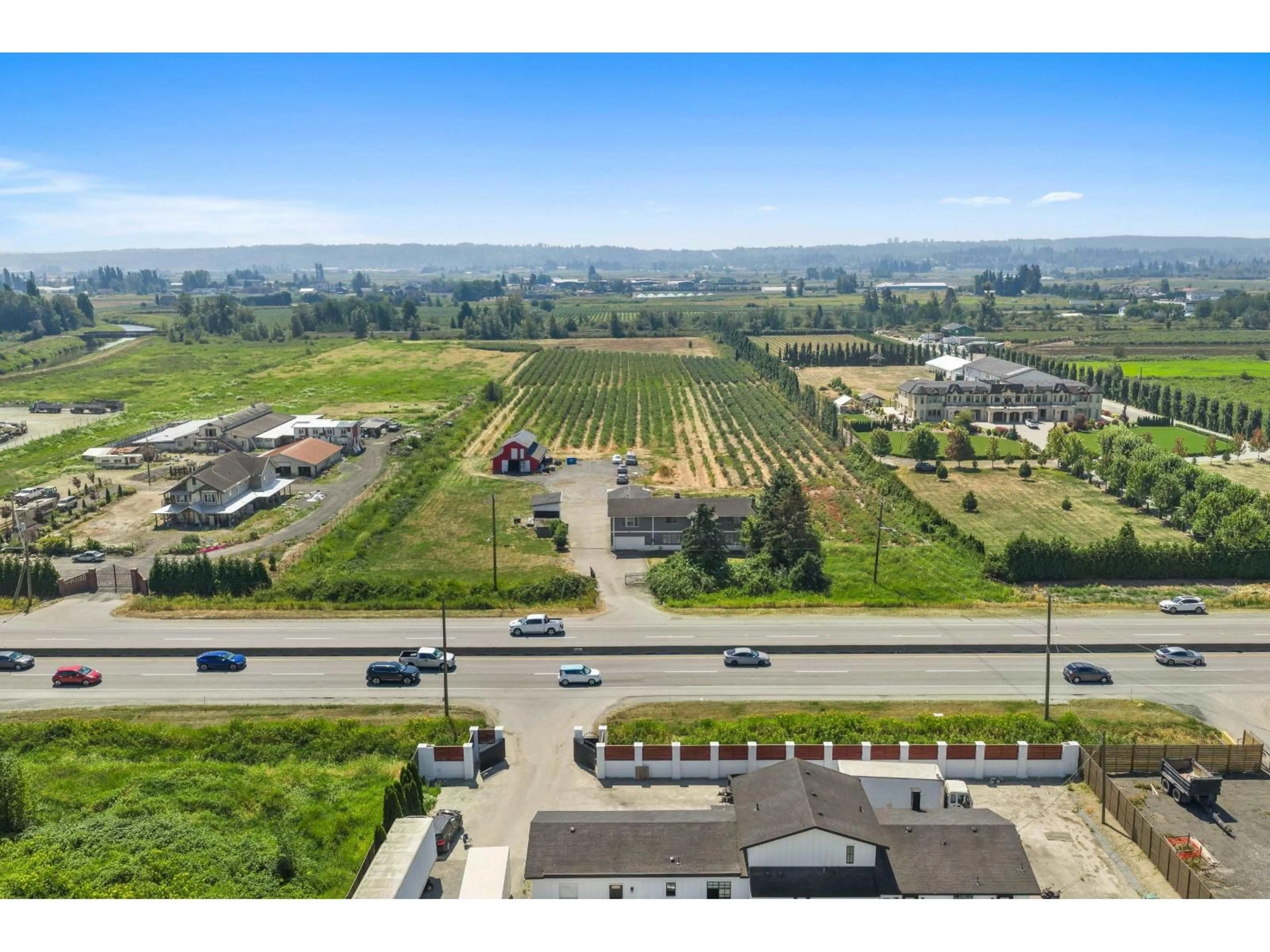 A pic from outside/outdoor area/front of a property/back of a property/a pic from drone, mountain view for 16212 56 AVENUE, Surrey British Columbia V3S2J7