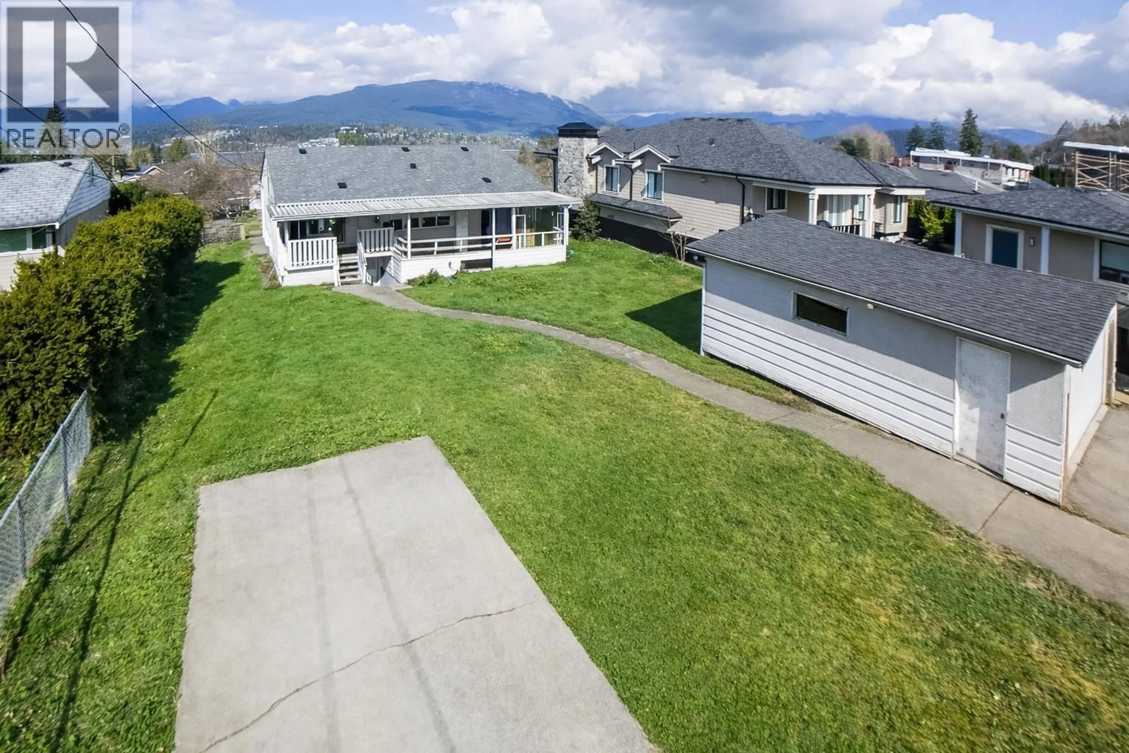 A pic from outside/outdoor area/front of a property/back of a property/a pic from drone, mountain view for 7016 SIERRA DRIVE, Burnaby British Columbia V5A1A5