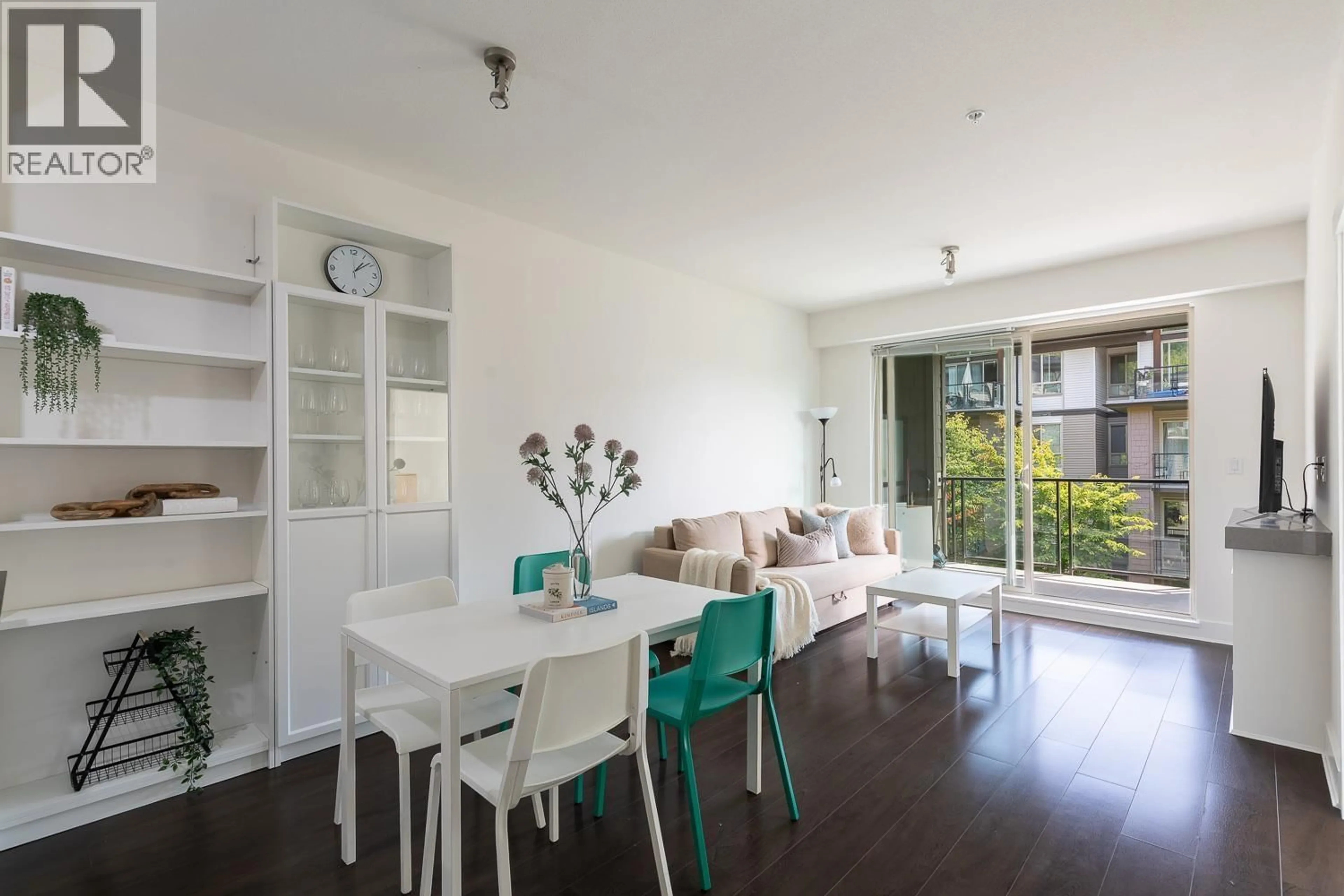 Living room with furniture, wood/laminate floor for 314 - 7418 BYRNEPARK WALK, Burnaby British Columbia V3N0B3