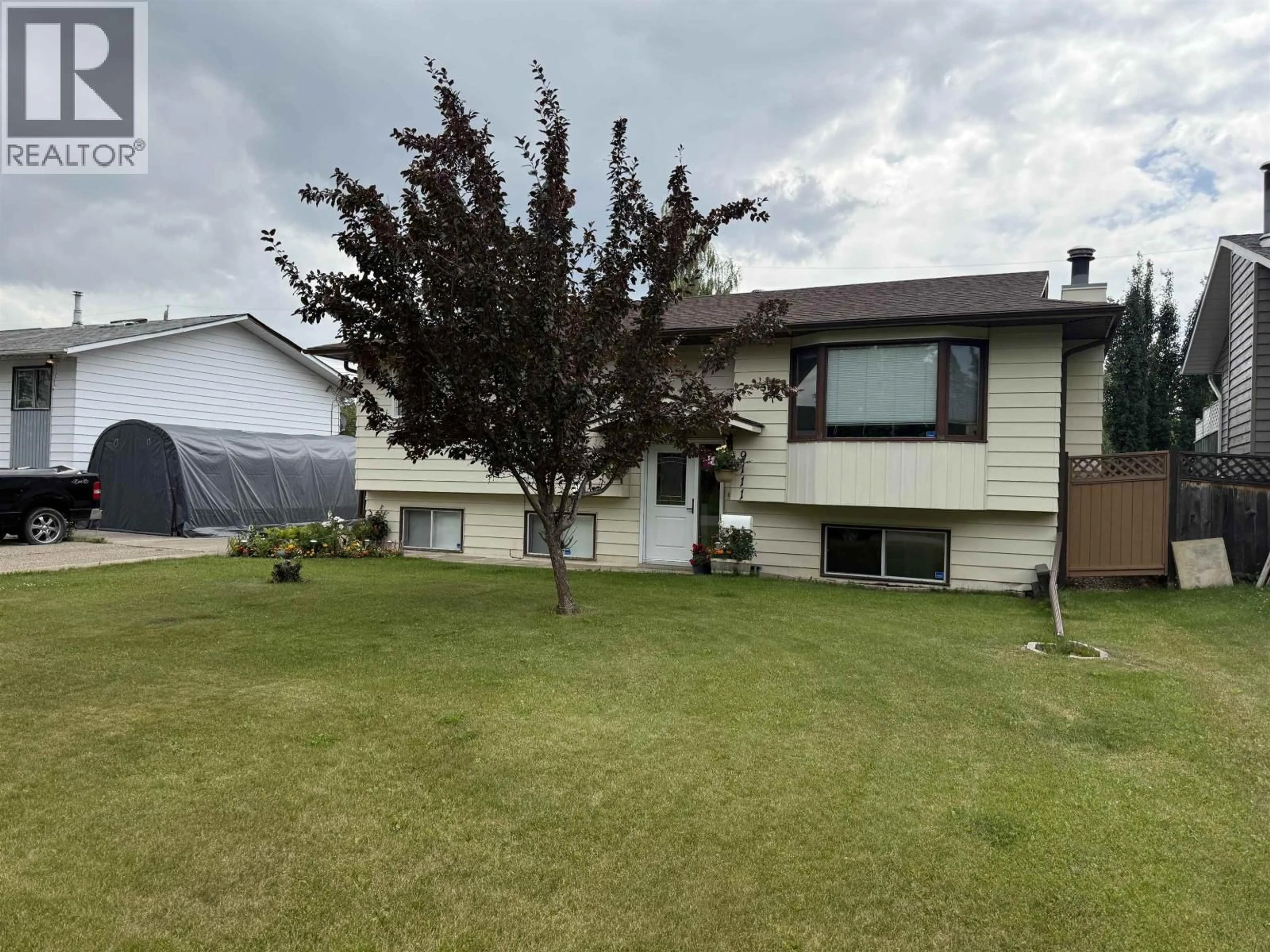 Home with vinyl exterior material, unknown for 9111 117 AVENUE, Fort St. John British Columbia V1J6A6