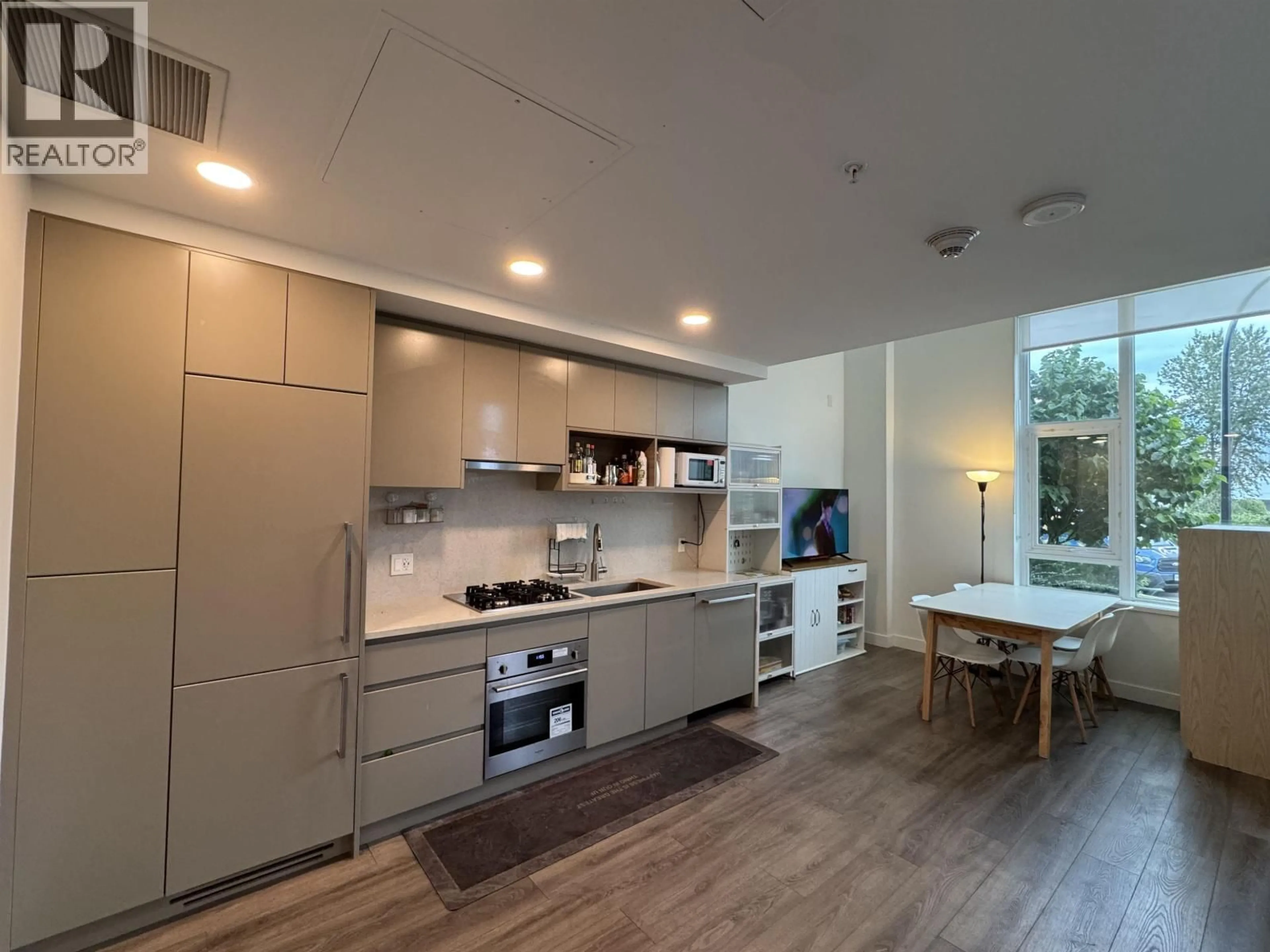 Open concept kitchen, unknown for 103 - 4433 ALASKA STREET, Burnaby British Columbia V5C5T3
