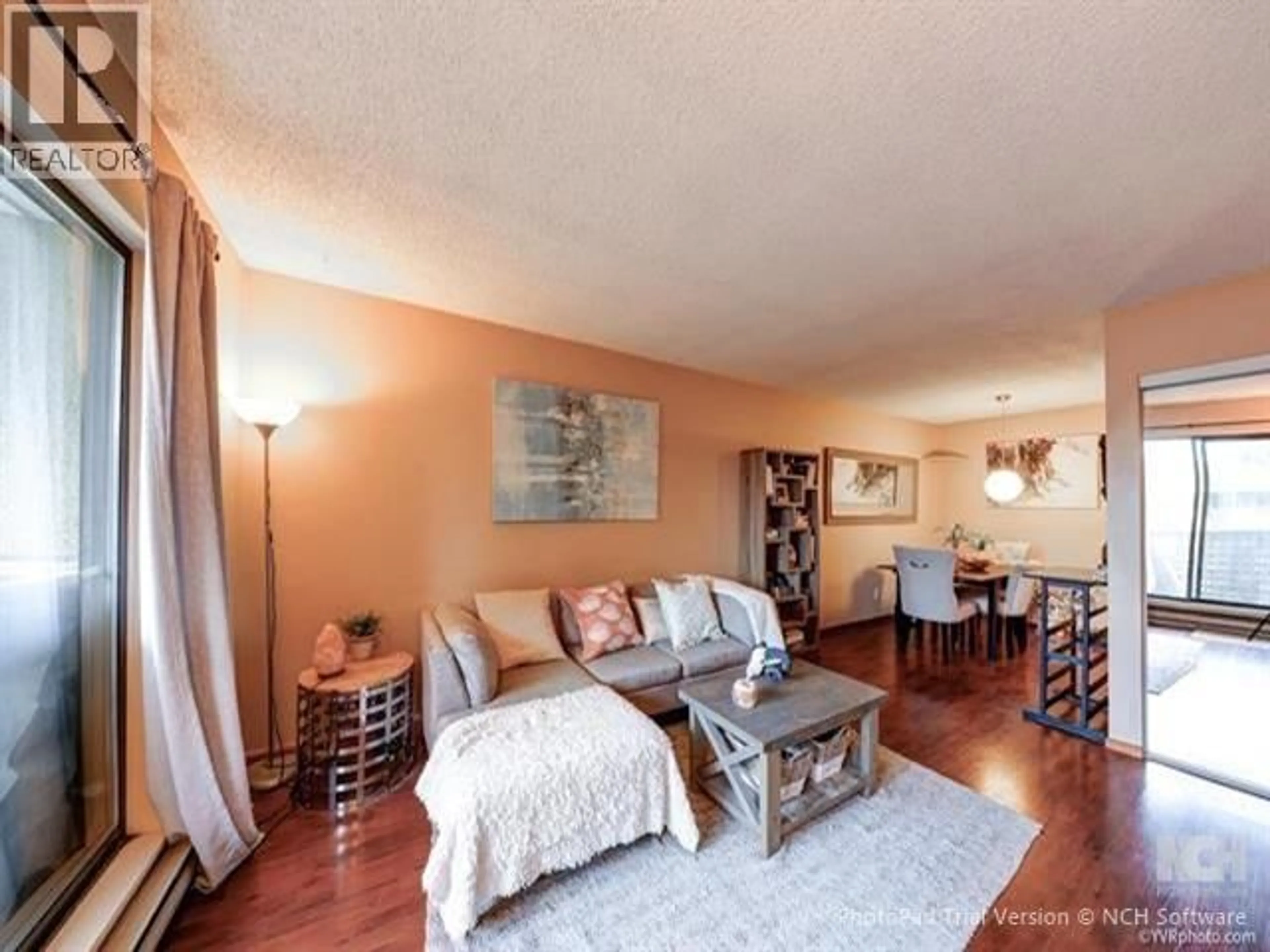 Living room with furniture, wood/laminate floor for 322 - 8700 ACKROYD ROAD, Richmond British Columbia V6X3G2