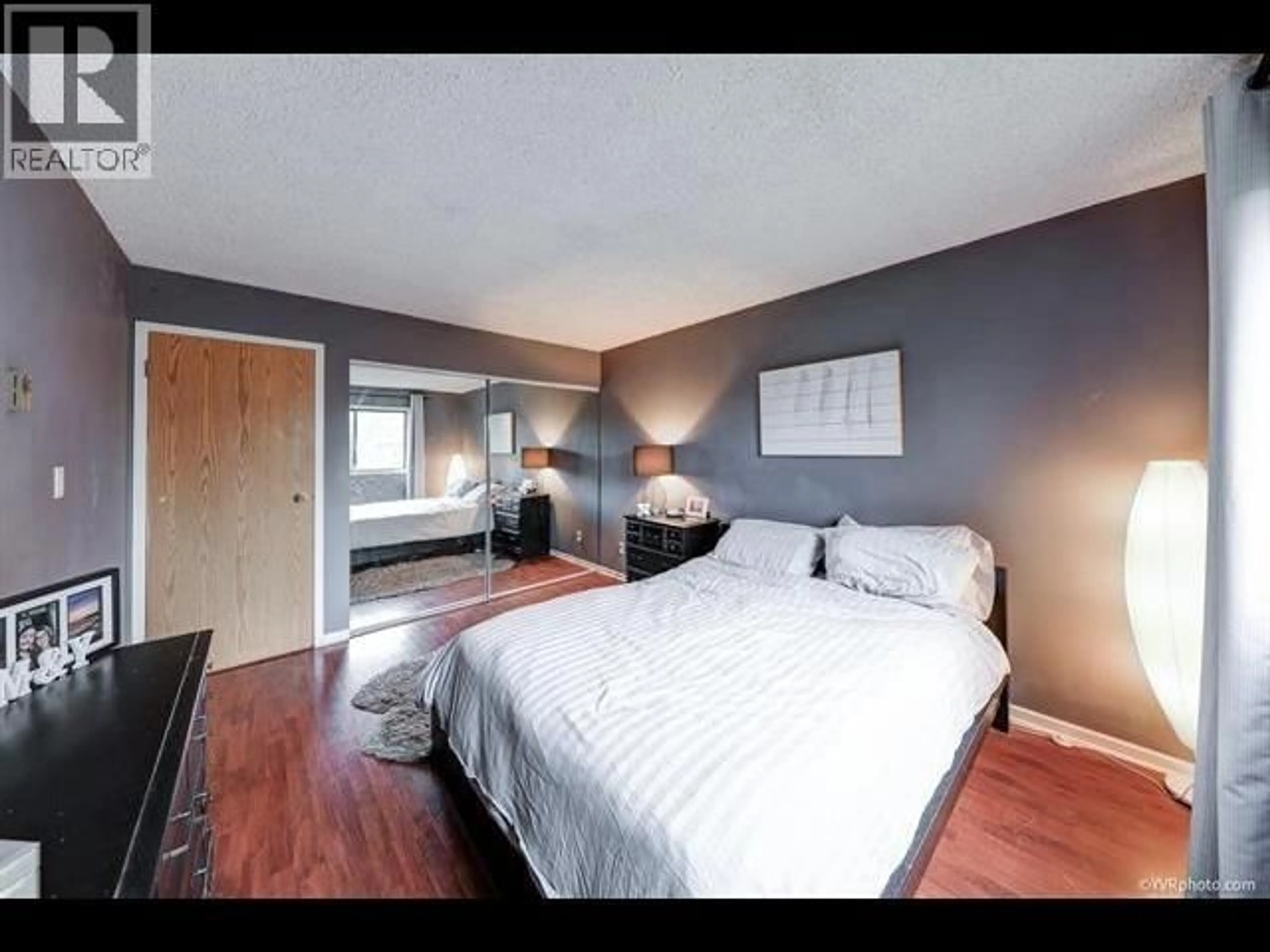Bedroom with bed, wood/laminate floor for 322 - 8700 ACKROYD ROAD, Richmond British Columbia V6X3G2