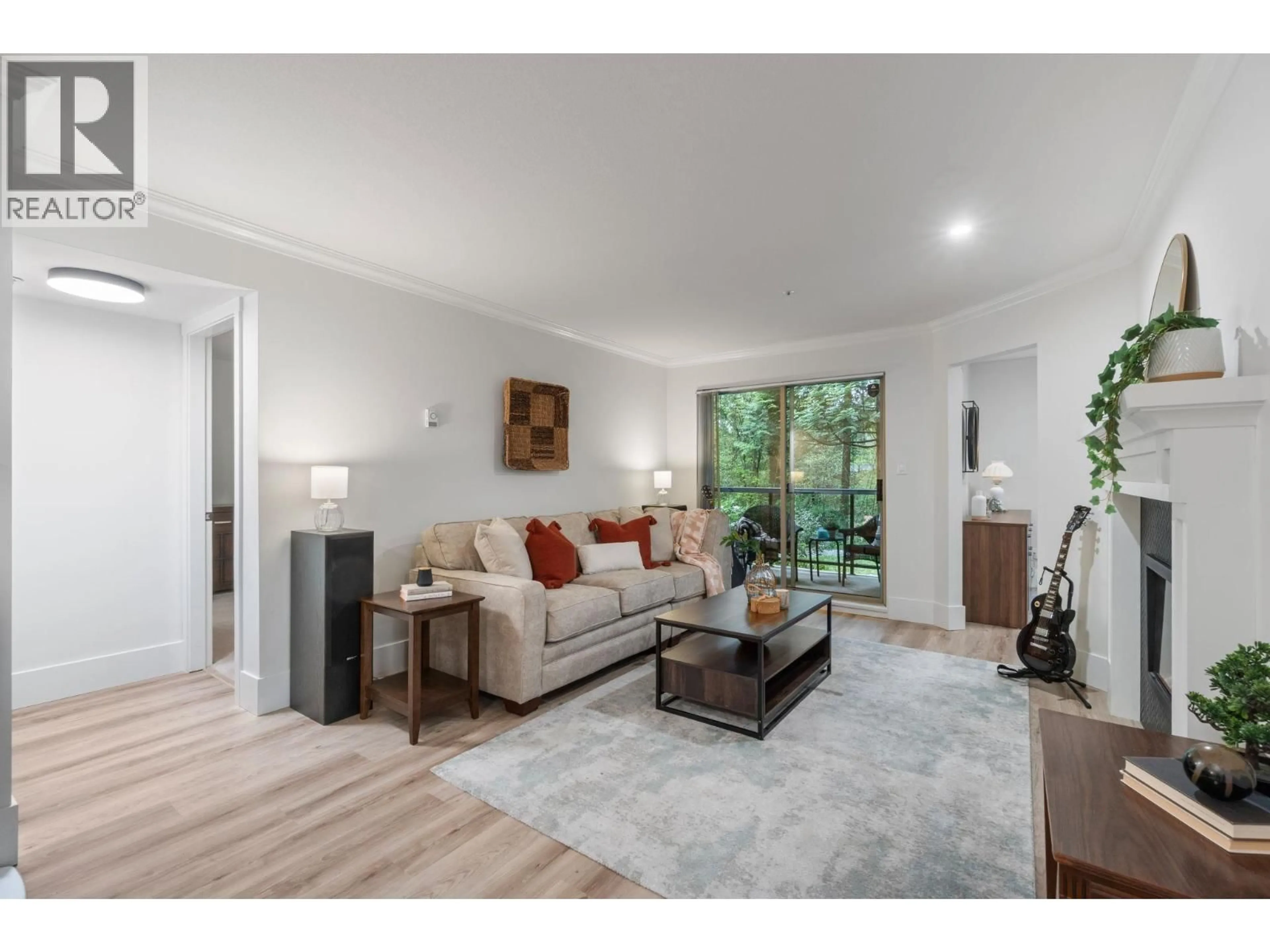 Living room with furniture, unknown for 104 - 180 RAVINE DRIVE, Port Moody British Columbia V3H4Z3