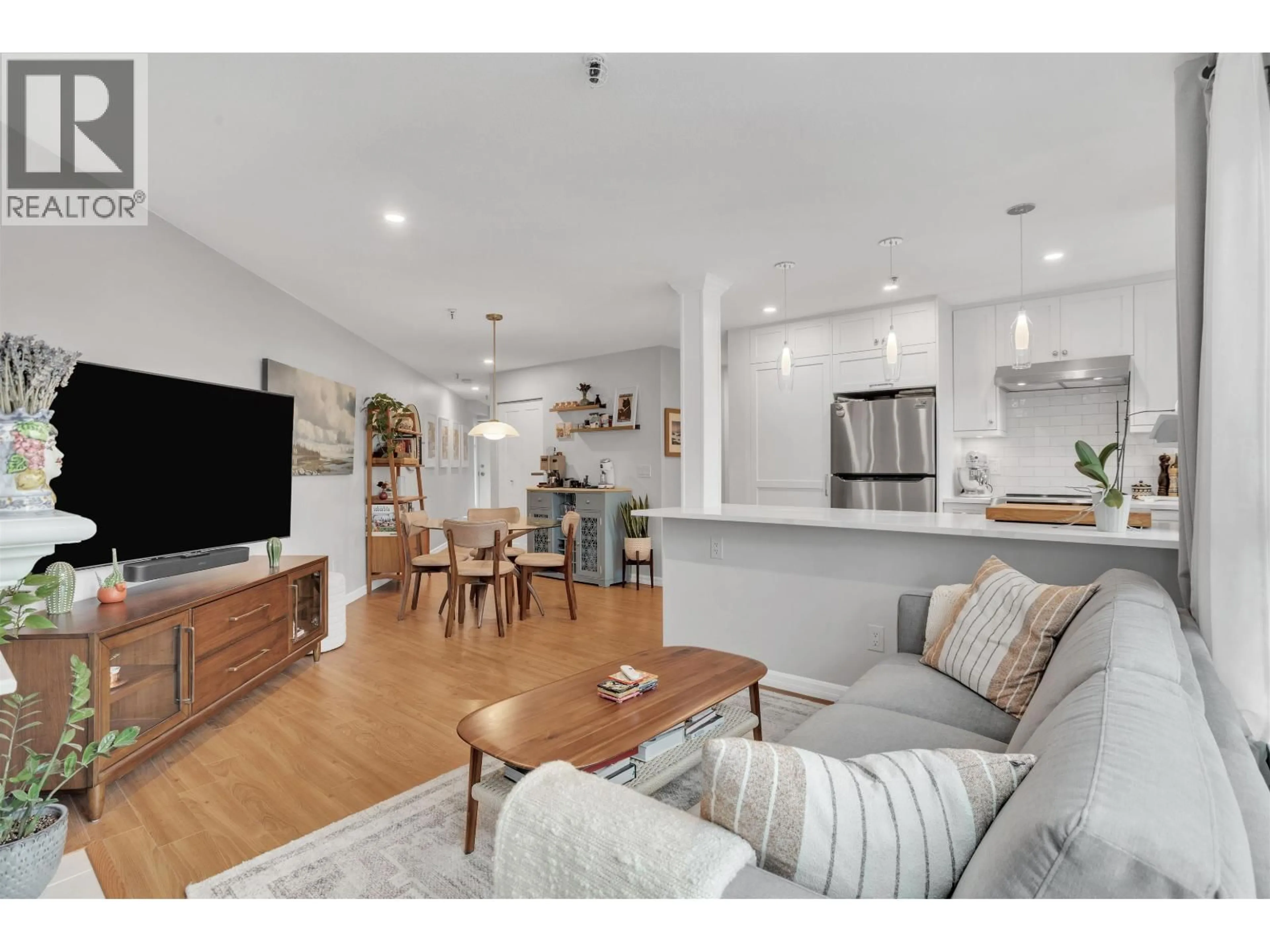 Open concept kitchen, wood/laminate floor for 315 - 2020 8TH AVENUE, Vancouver British Columbia V6J1W5