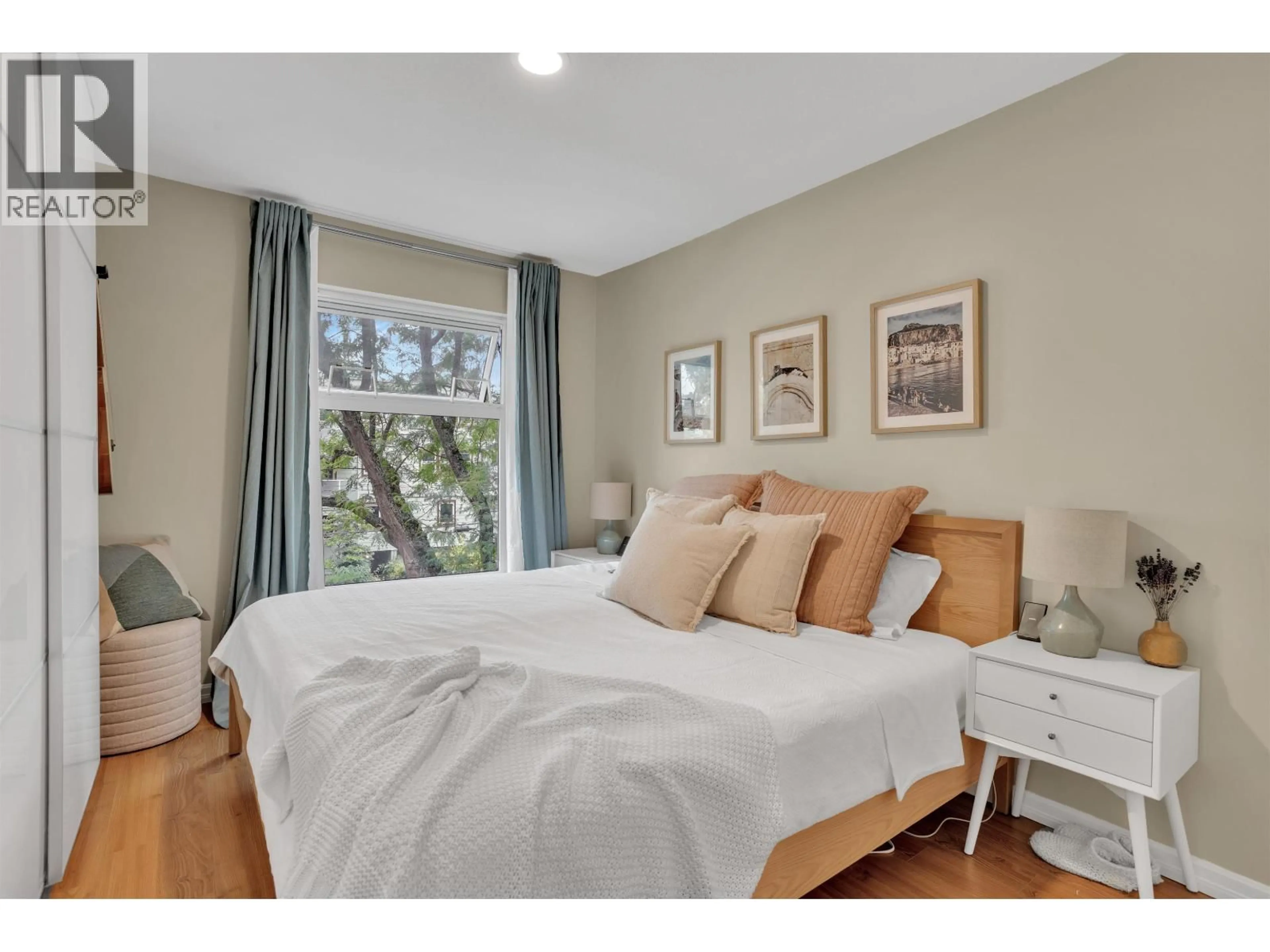Bedroom with bed, wood/laminate floor for 315 - 2020 8TH AVENUE, Vancouver British Columbia V6J1W5