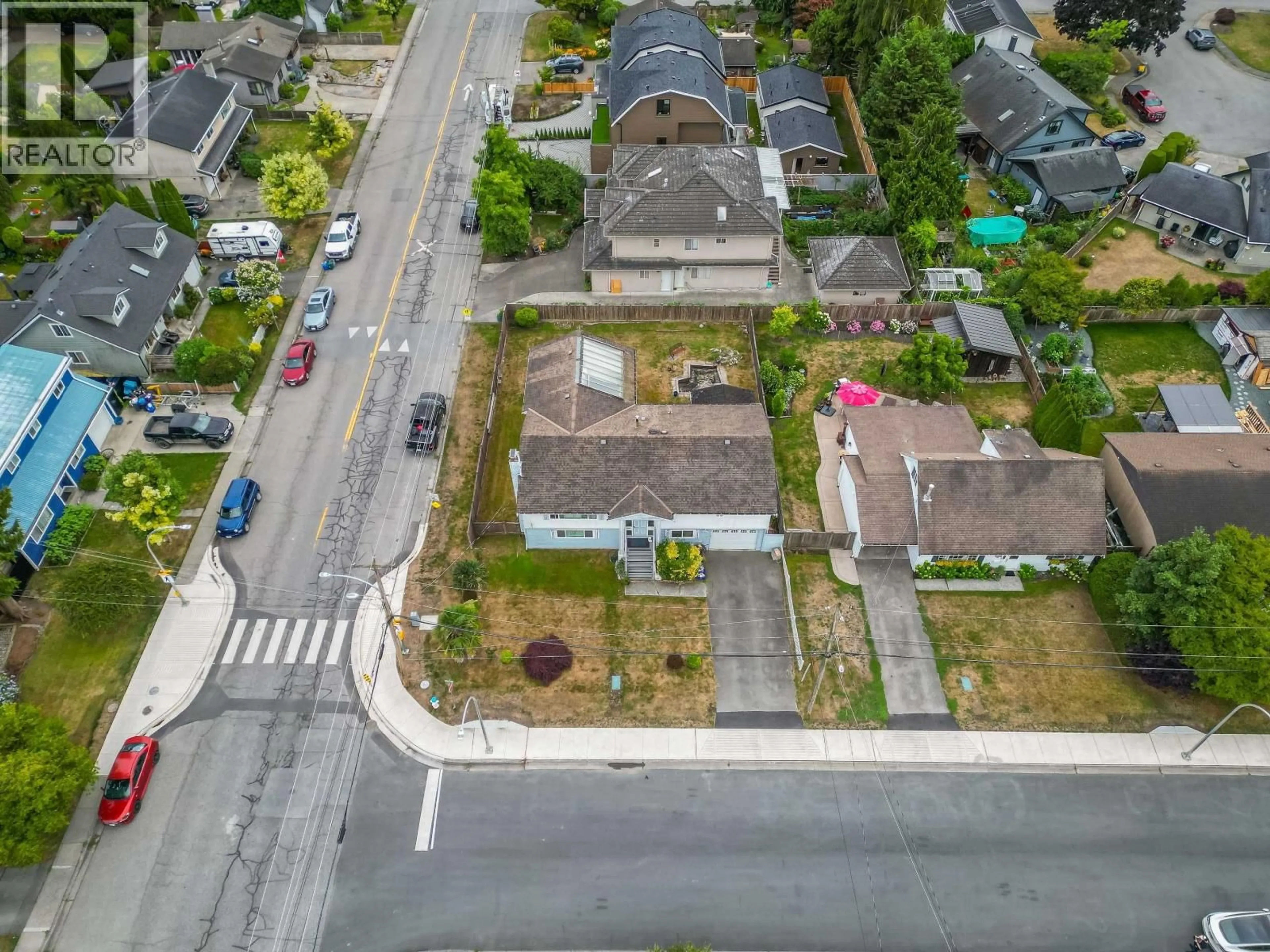 A pic from outside/outdoor area/front of a property/back of a property/a pic from drone, street for 4630 44B AVENUE, Delta British Columbia V4K1H4