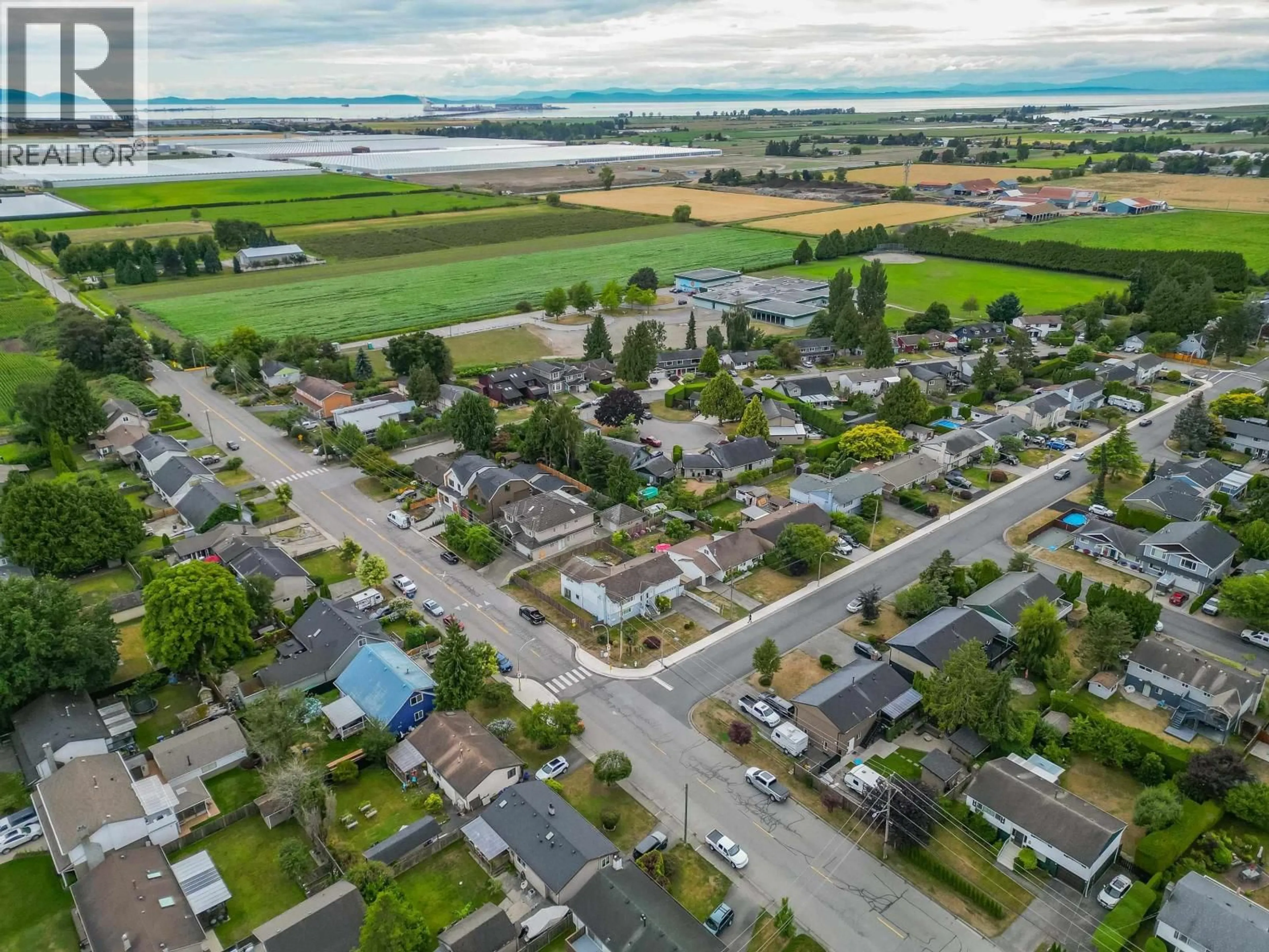 A pic from outside/outdoor area/front of a property/back of a property/a pic from drone, street for 4630 44B AVENUE, Delta British Columbia V4K1H4
